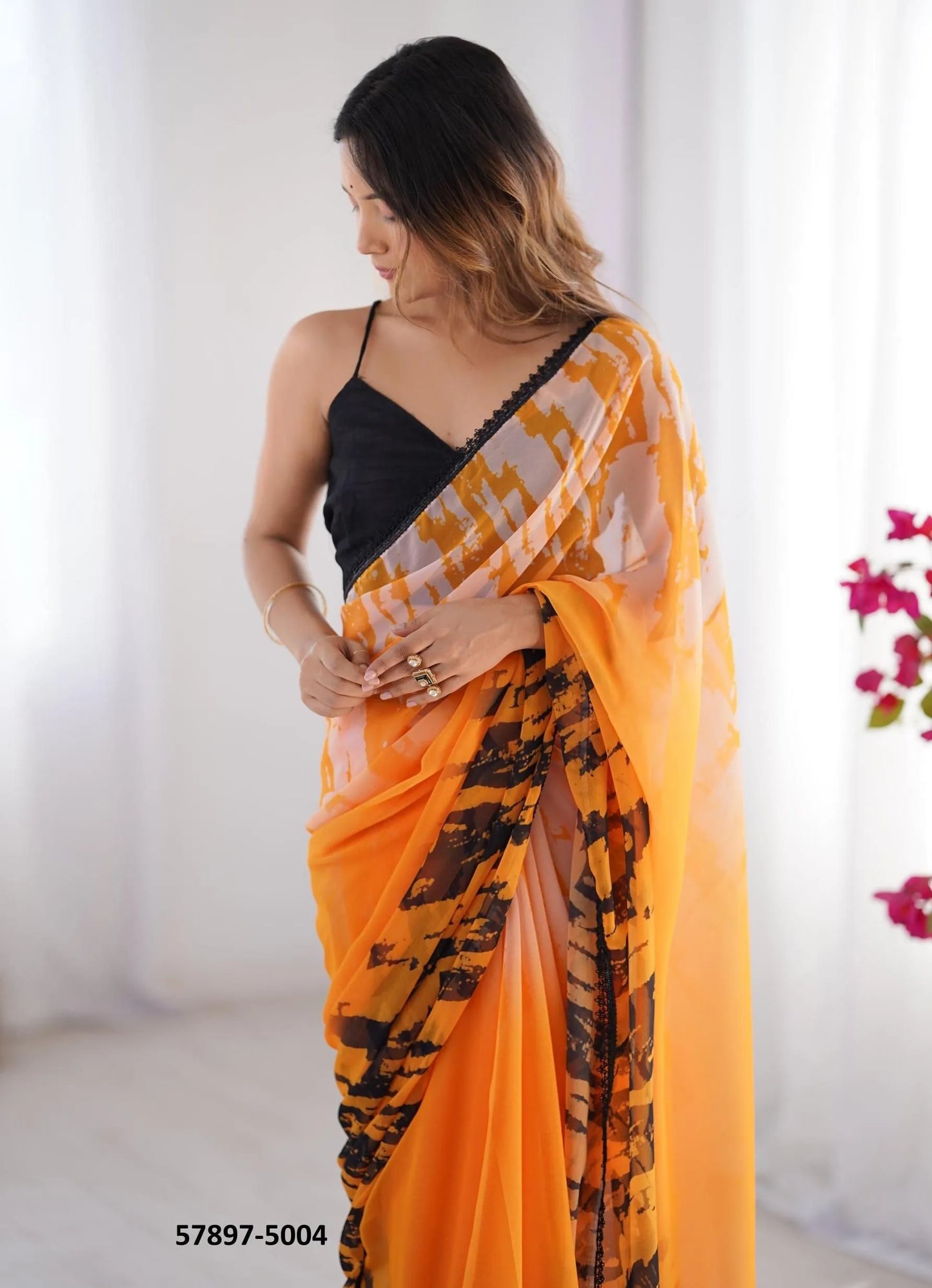 Orange Georgette Fashionable Saree For Kitty-Parties