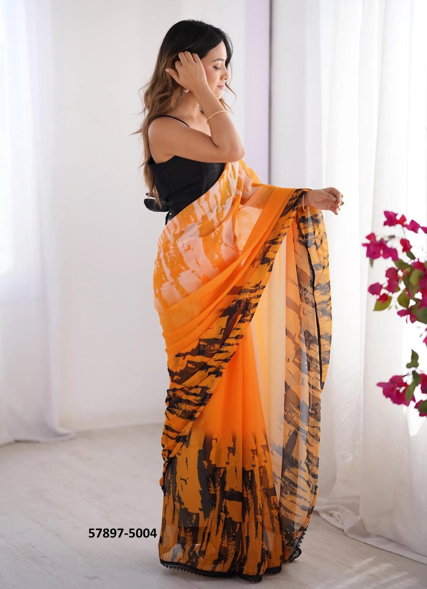 Orange Georgette Fashionable Saree For Kitty-Parties