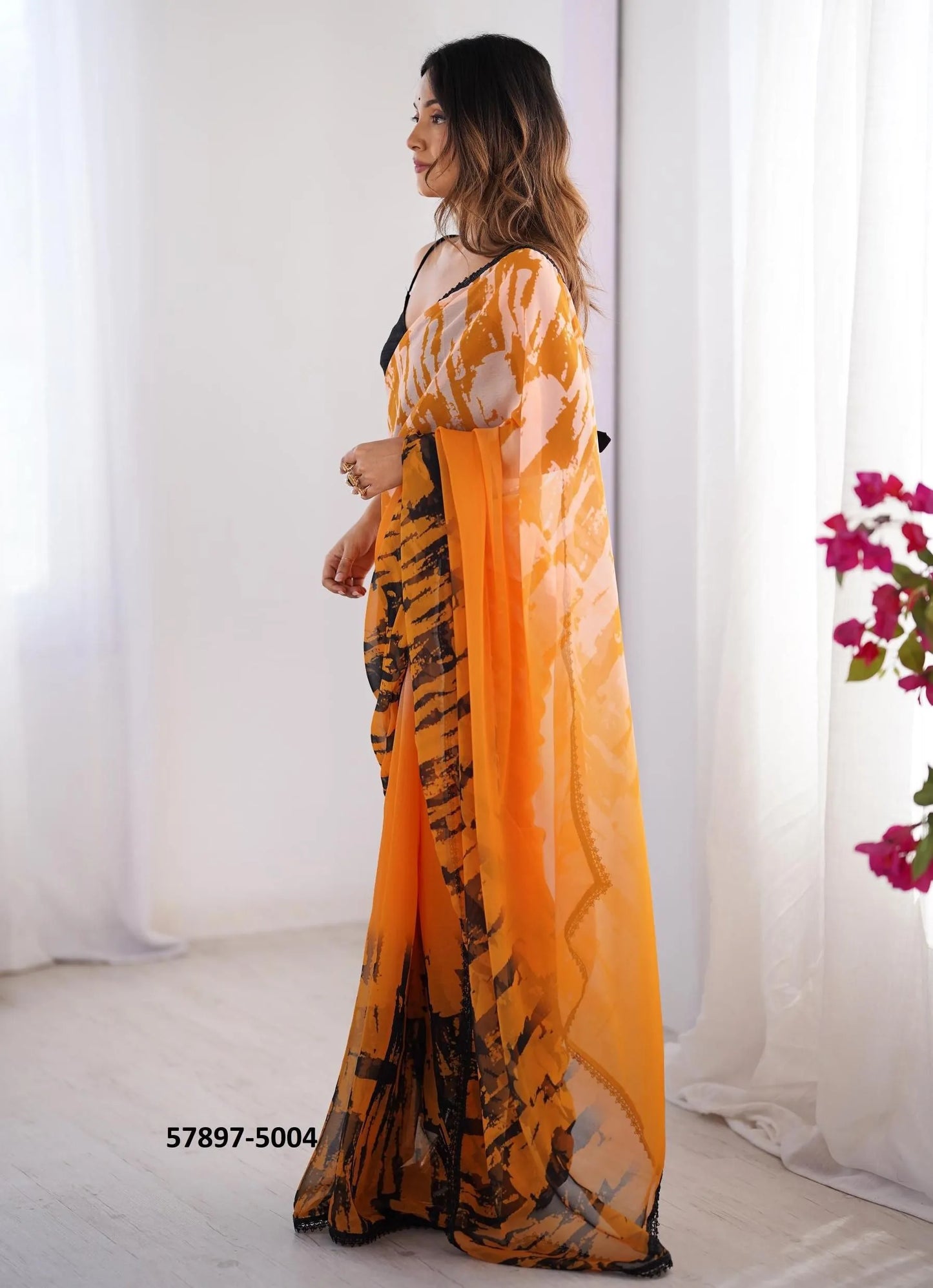 Orange Georgette Fashionable Saree For Kitty-Parties
