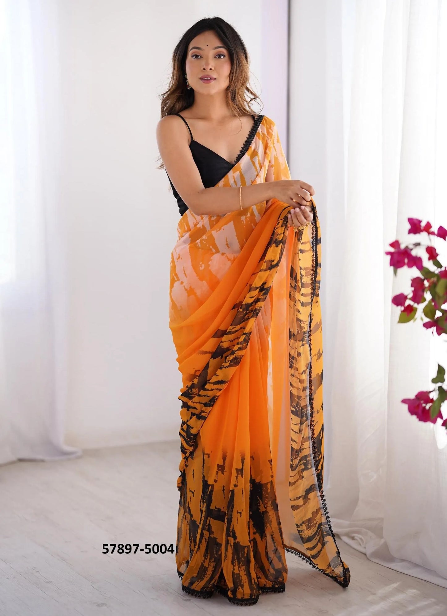 Orange Georgette Fashionable Saree For Kitty-Parties