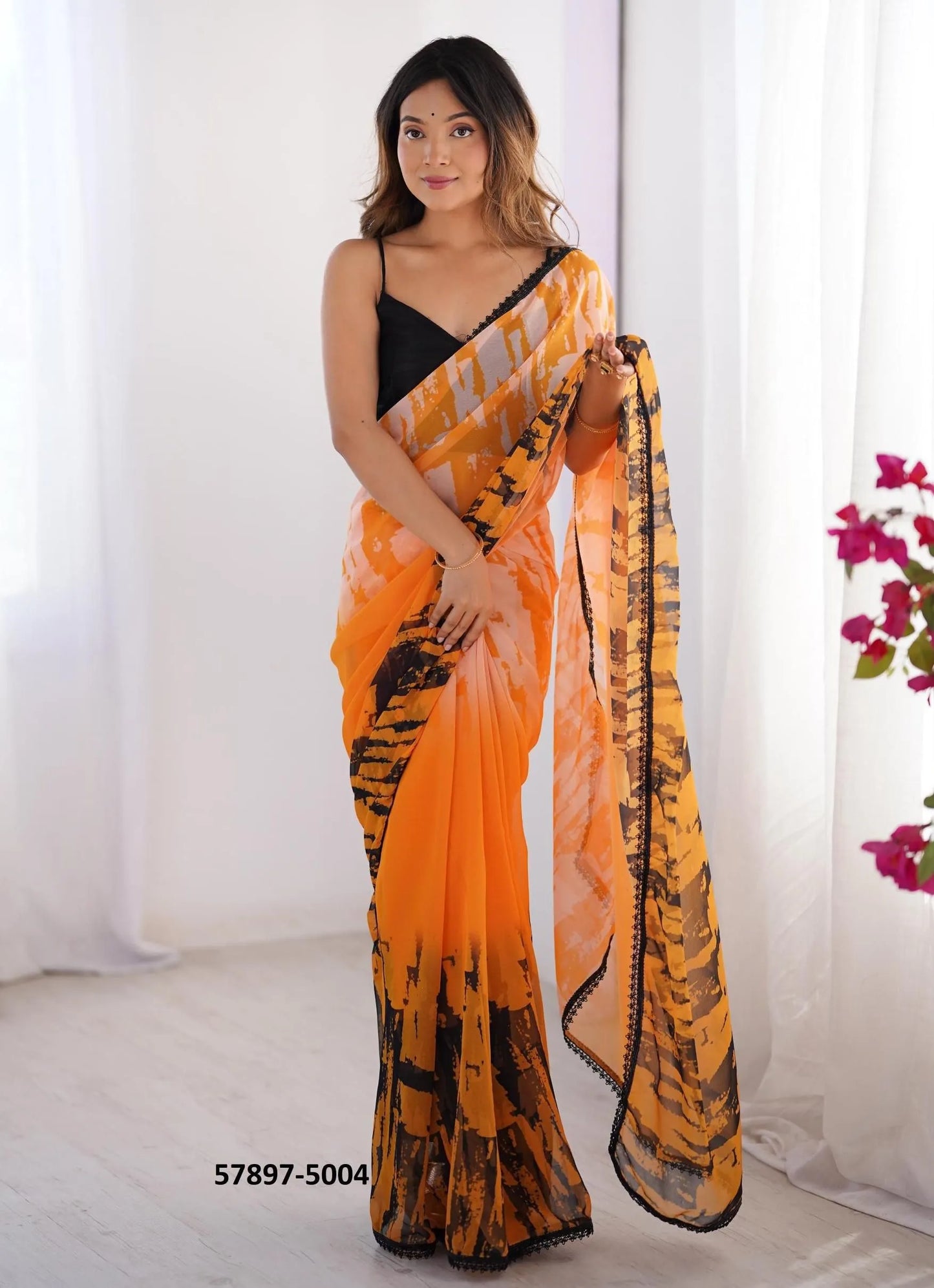 Orange Georgette Fashionable Saree For Kitty-Parties