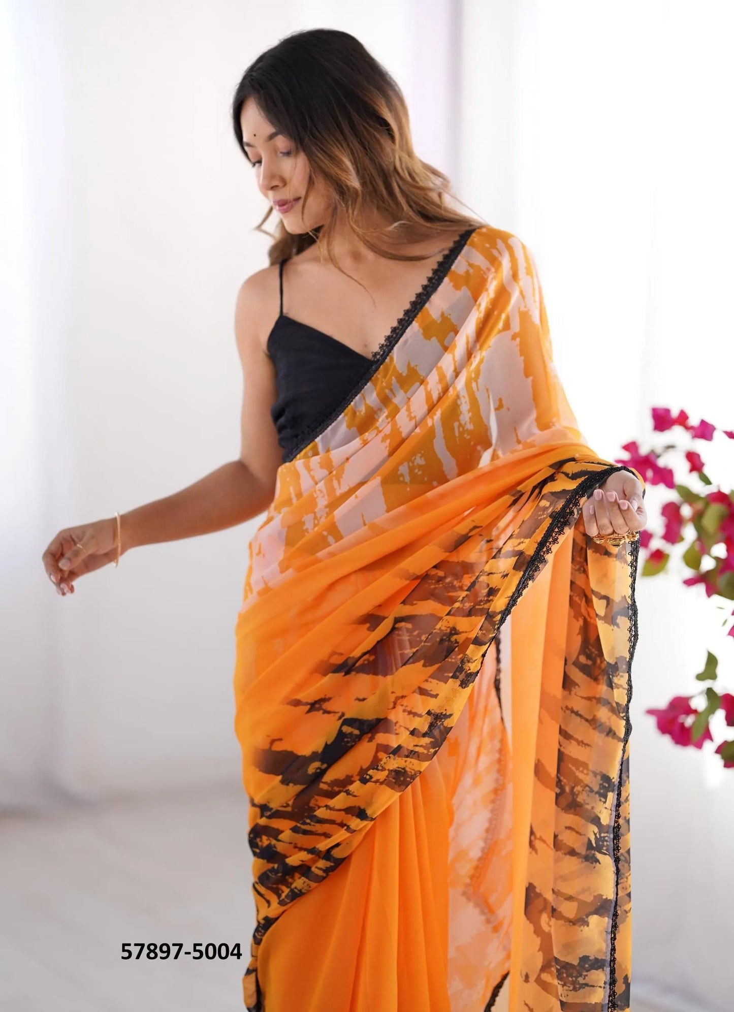 Orange Georgette Fashionable Saree For Kitty-Parties