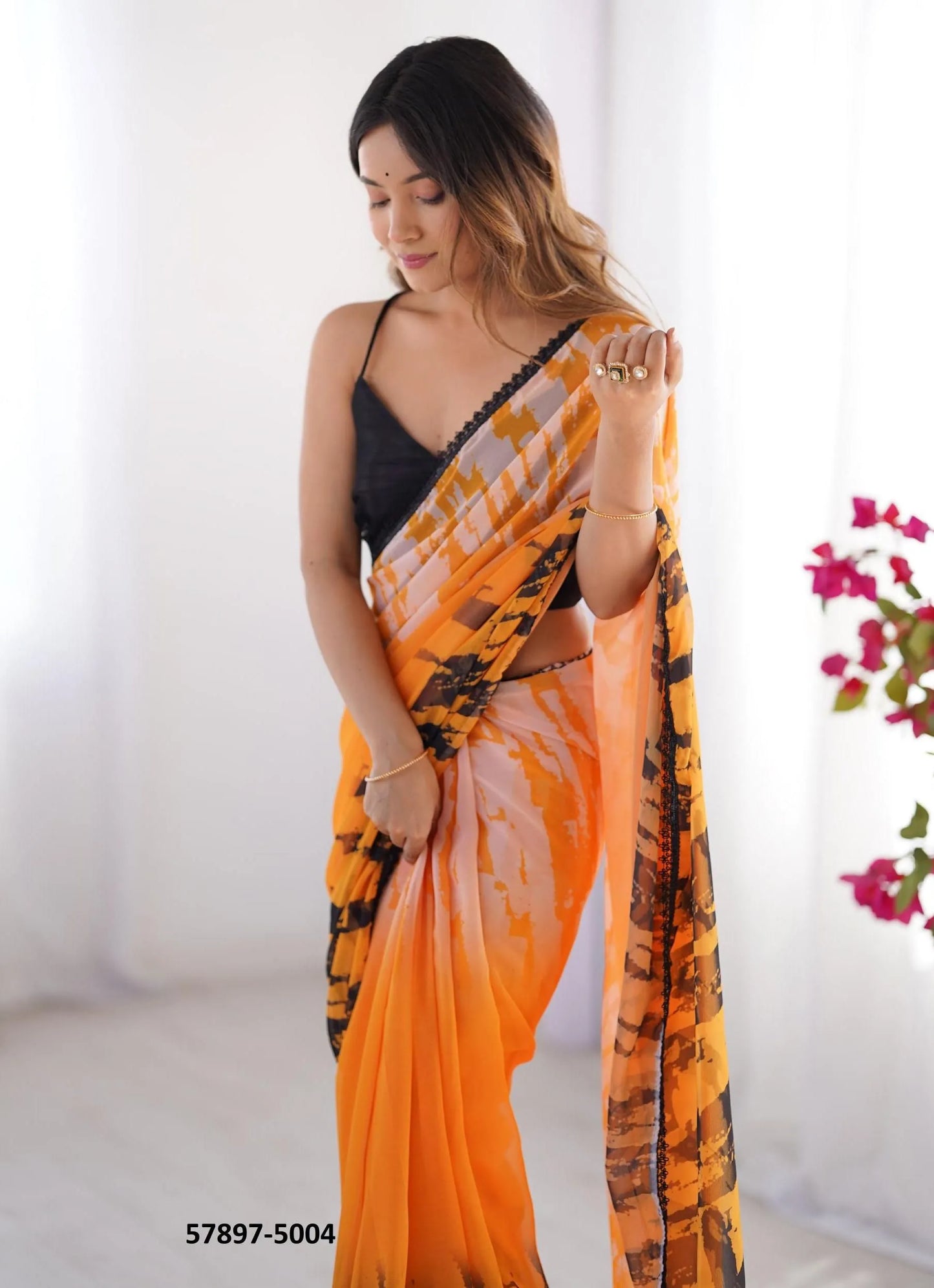 Orange Georgette Fashionable Saree For Kitty-Parties