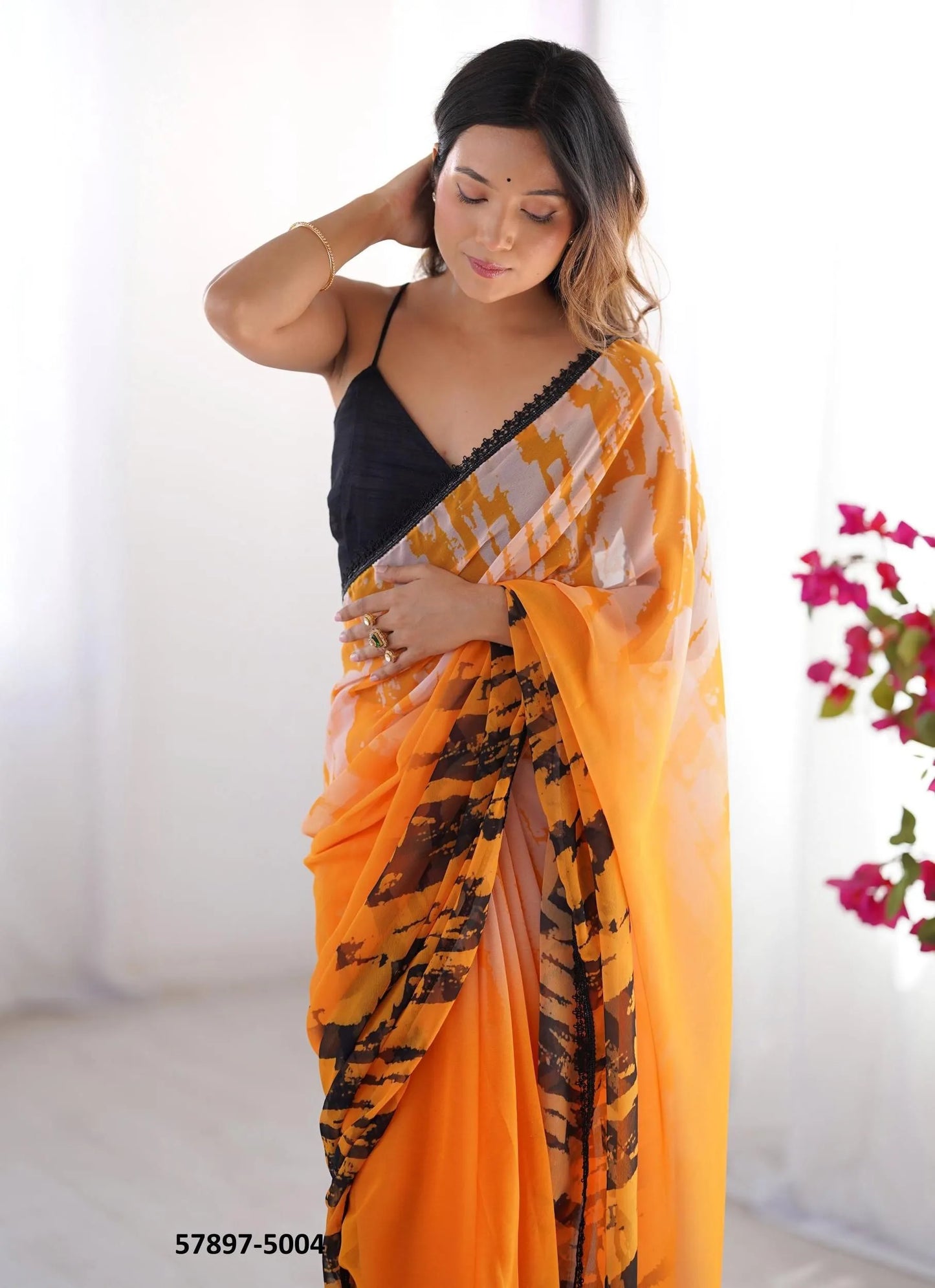 Orange Georgette Fashionable Saree For Kitty-Parties