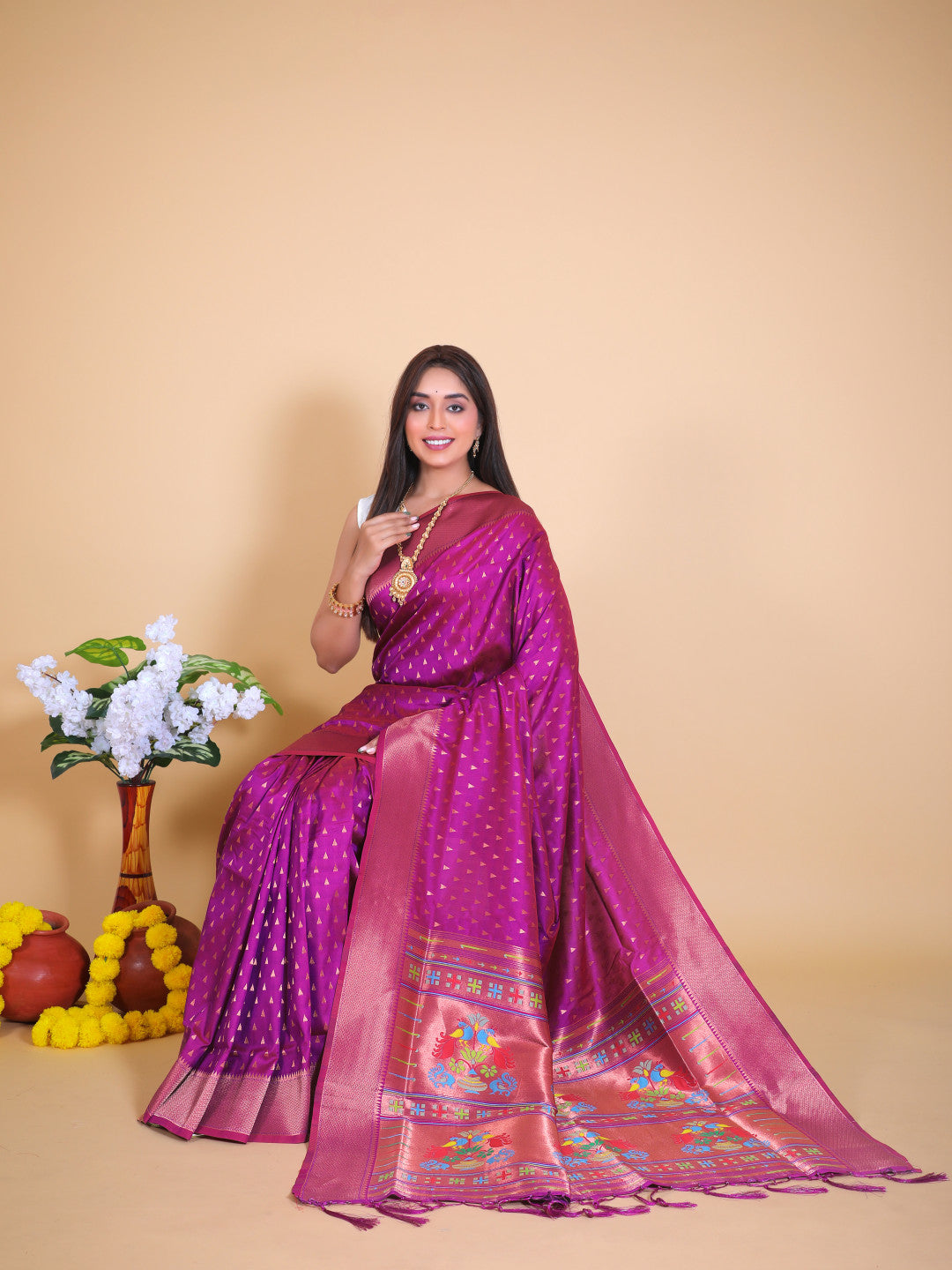 Magenta color paithani silk saree with zari weaving work