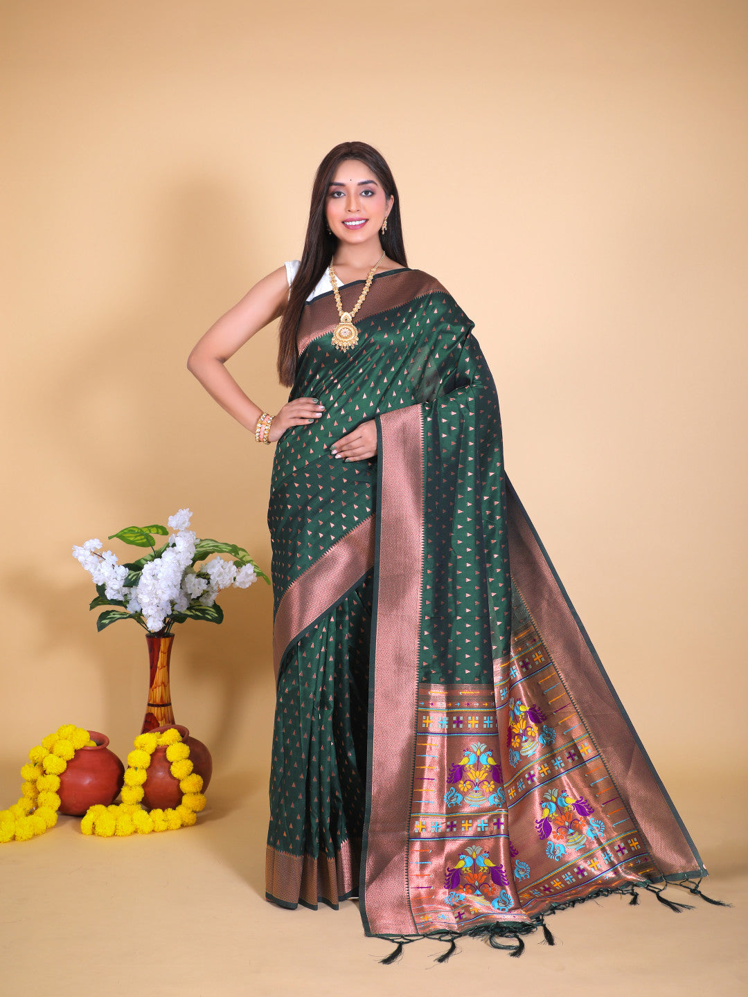 Bottle green color paithani silk saree with zari weaving work