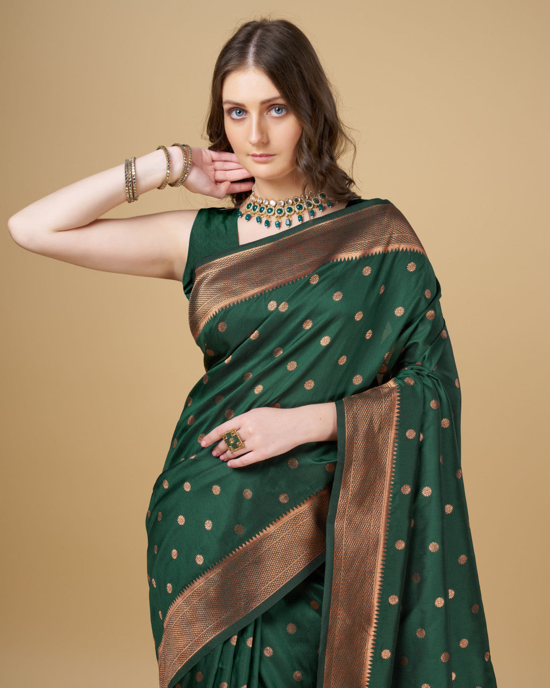 Dark green color paithani silk saree with copper zari weaving work