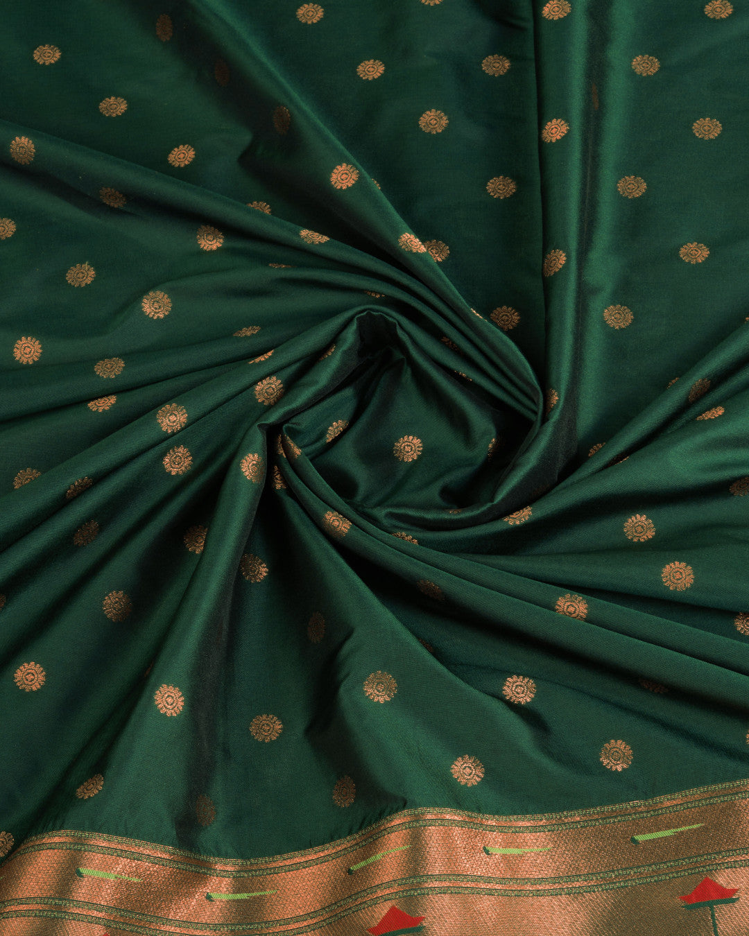 Dark green color paithani silk saree with copper zari weaving work
