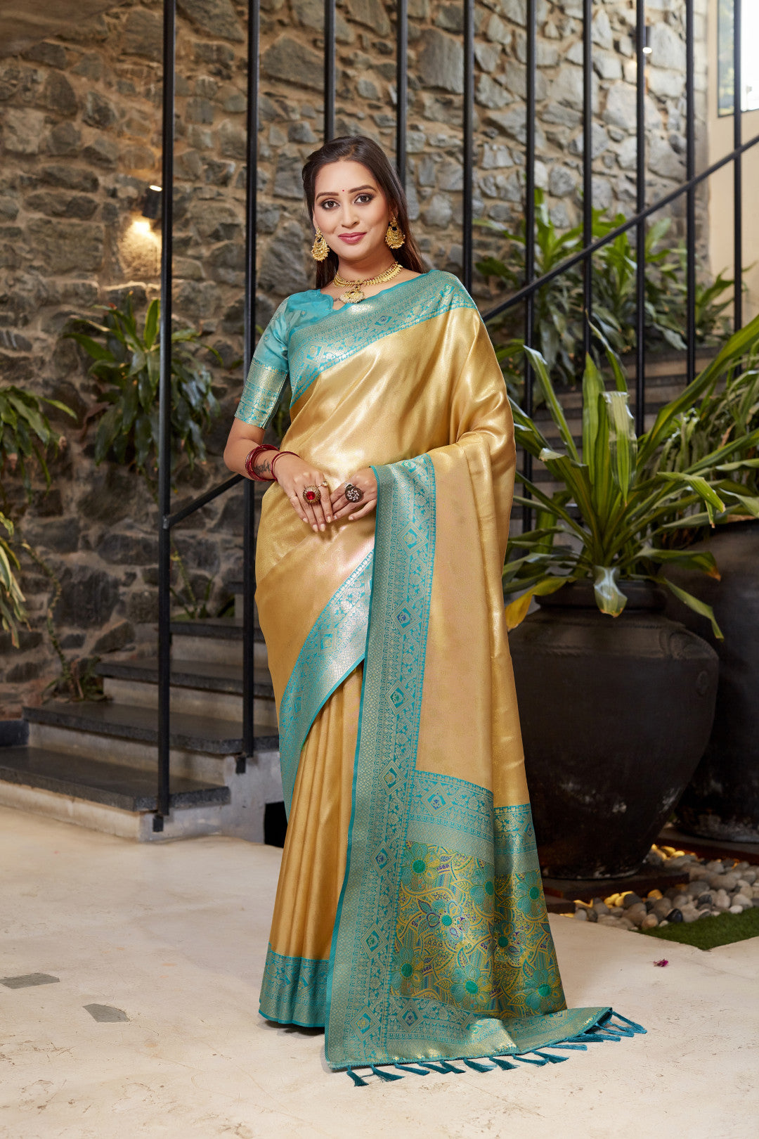 Soft flowy beige color tissue silk saree with contrast woven border & blouse