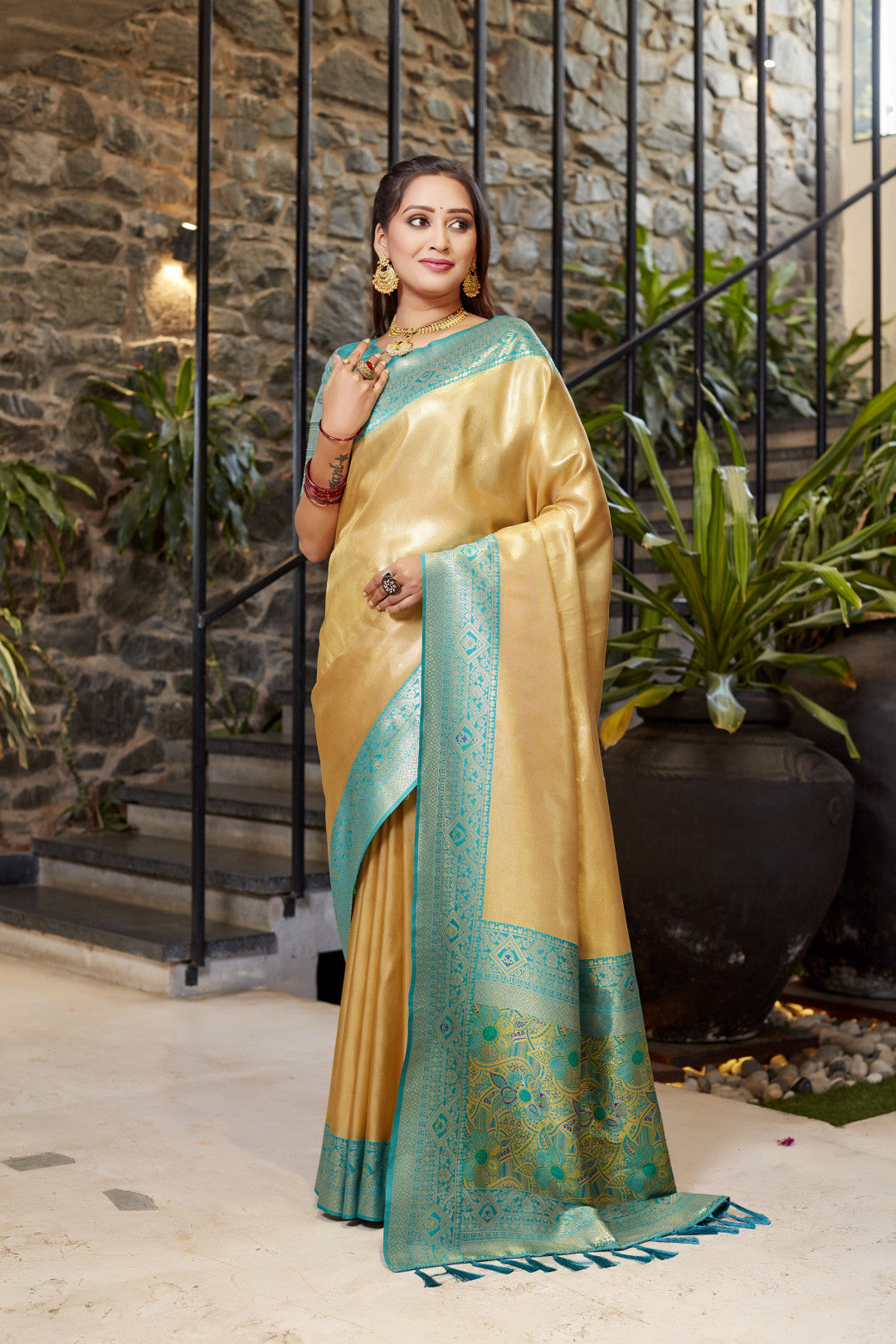 Soft flowy beige color tissue silk saree with contrast woven border & blouse