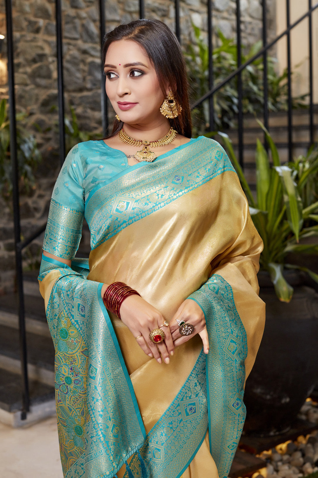 Soft flowy beige color tissue silk saree with contrast woven border & blouse