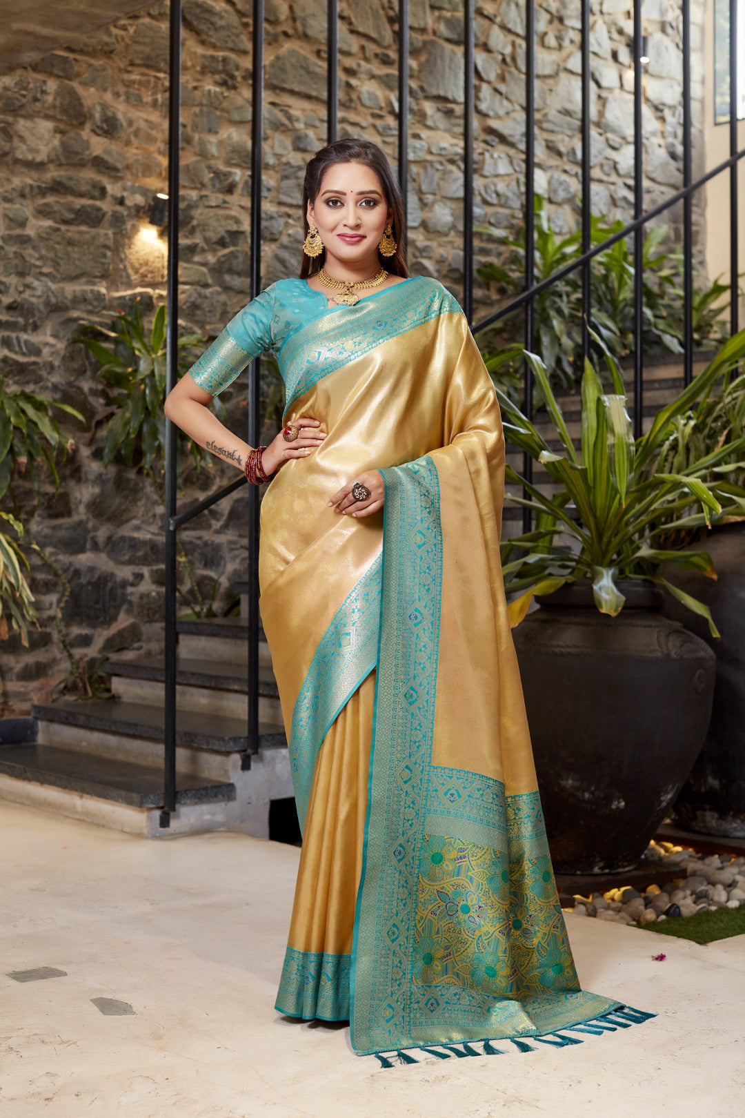 Soft flowy beige color tissue silk saree with contrast woven border & blouse