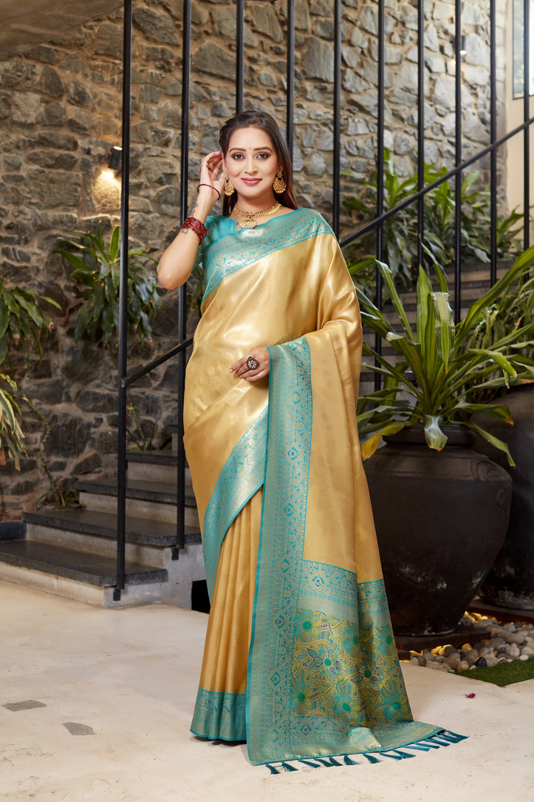 Soft flowy beige color tissue silk saree with contrast woven border & blouse