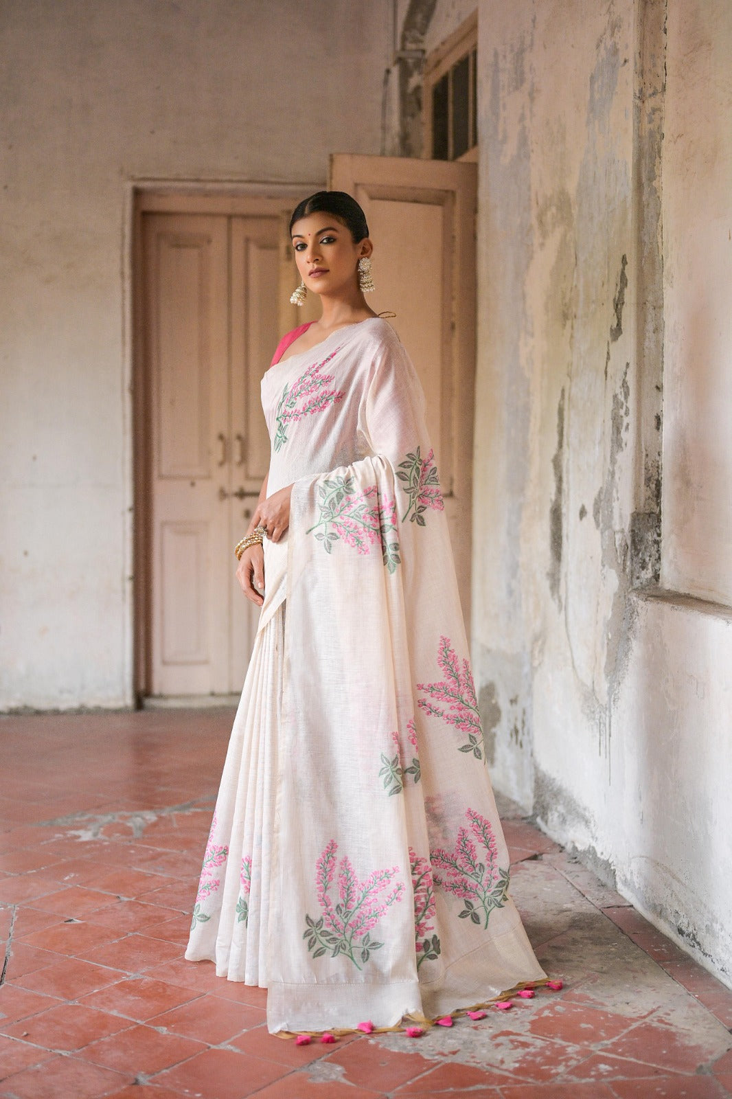 Off white color soft muga silk saree with weaving work