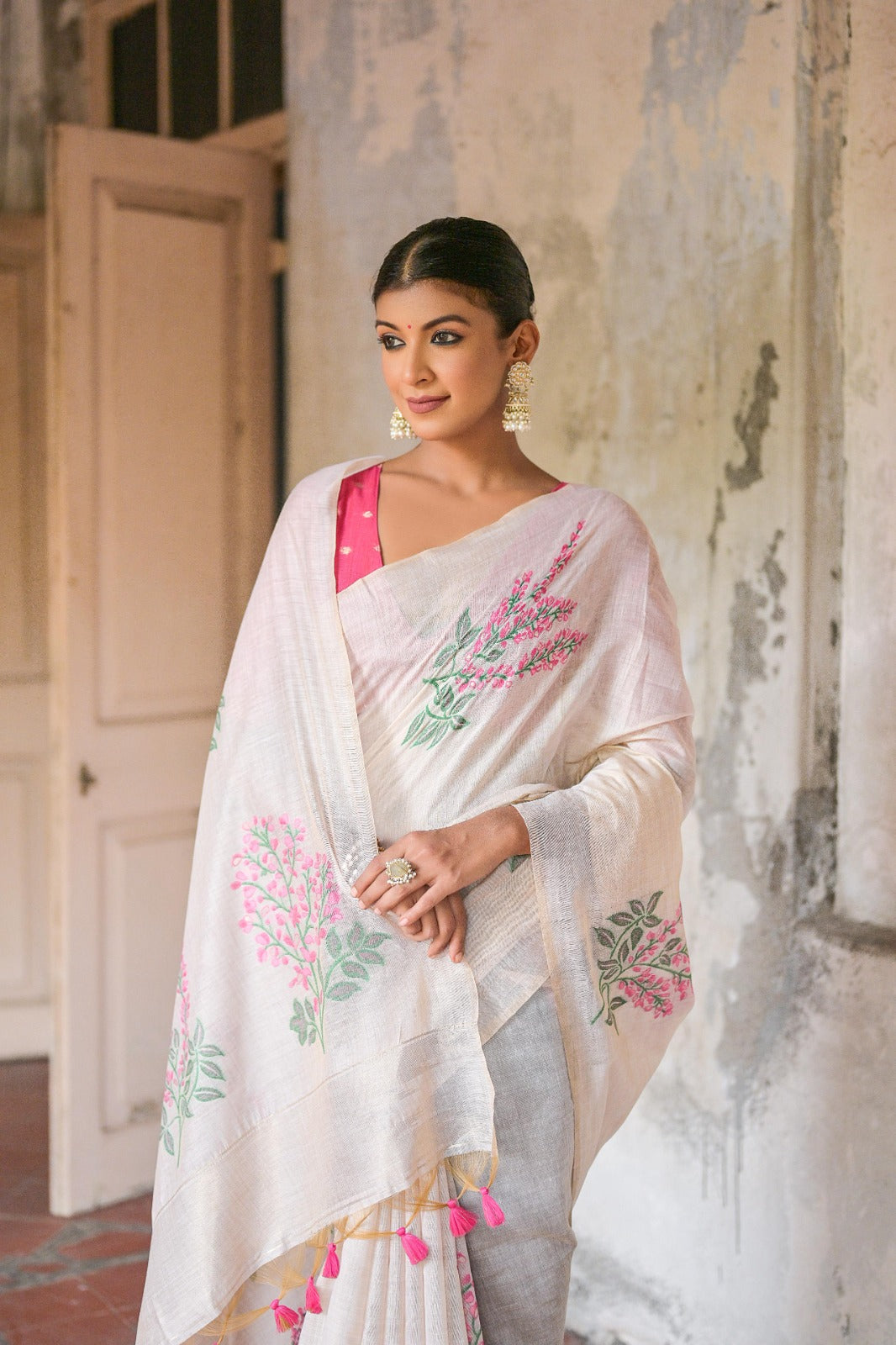 Off white color soft muga silk saree with weaving work