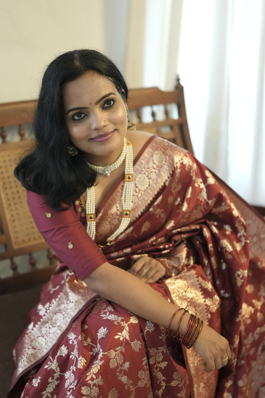 Maroon pure silk saree with zari weaving work