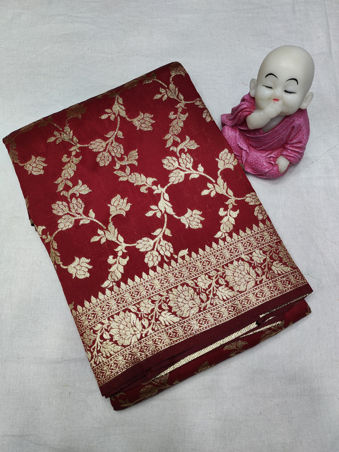 Maroon pure silk saree with zari weaving work