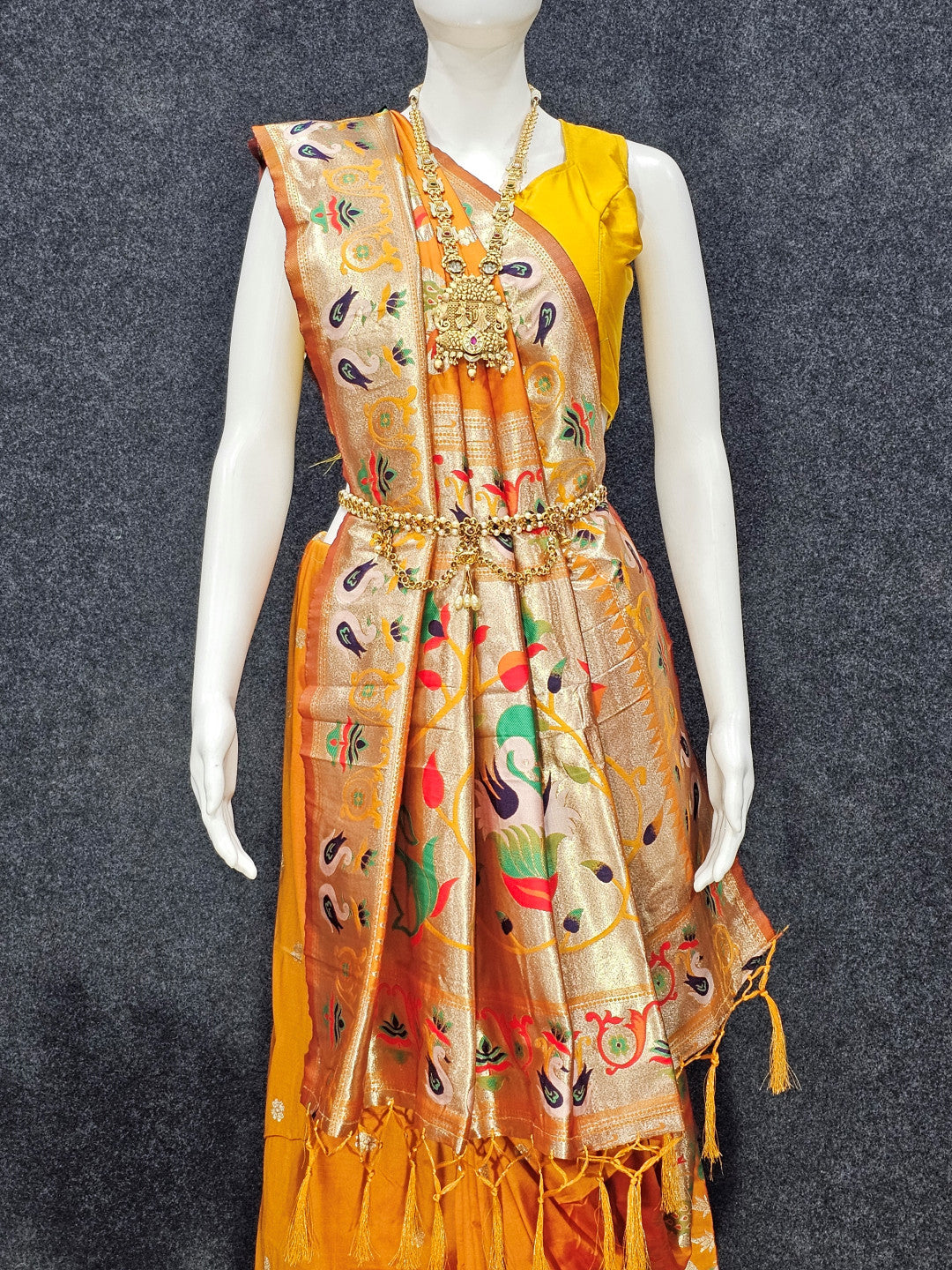 Mustard yellow paithani silk saree with zari weaving work