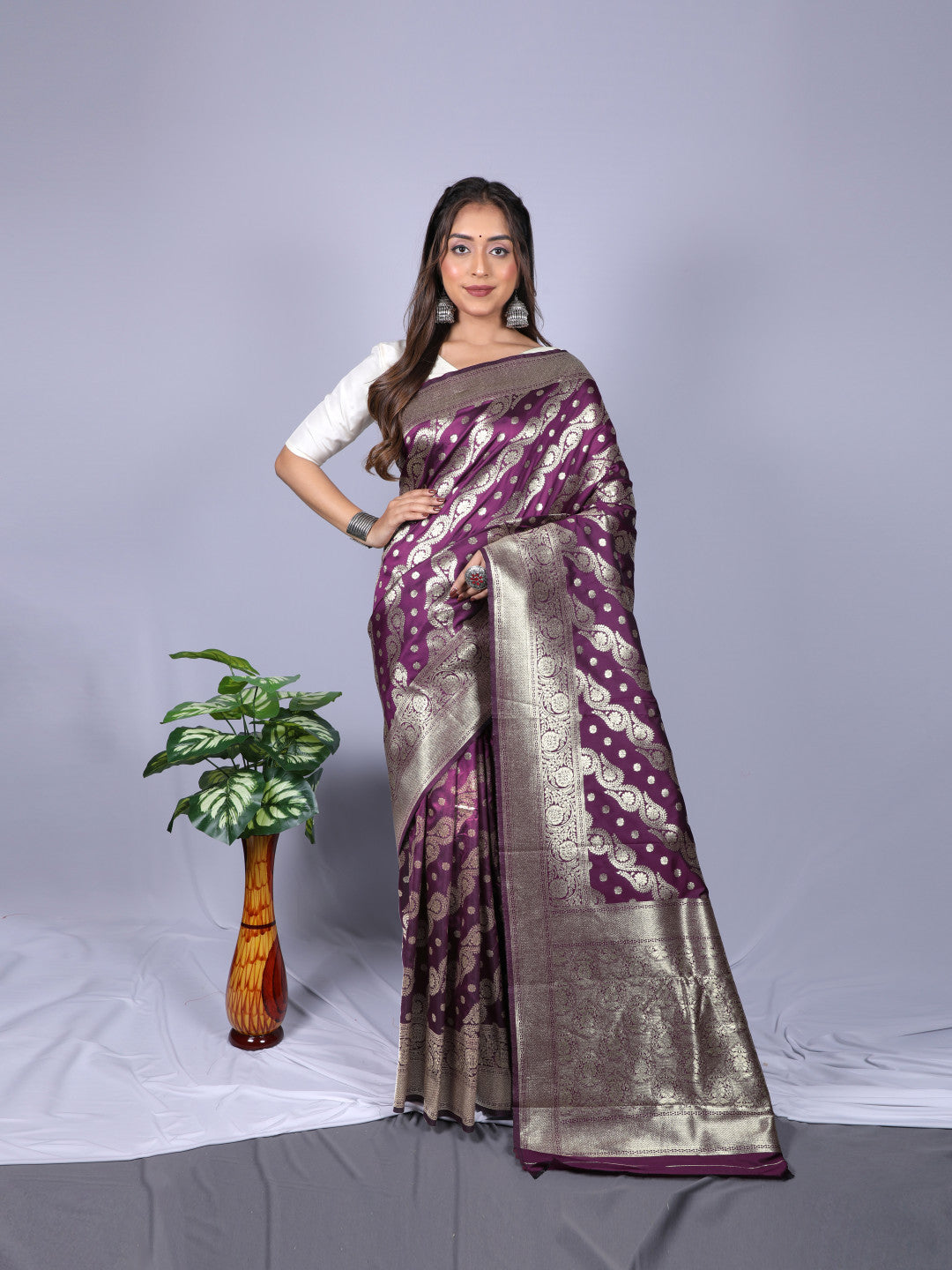 Magenta color banarasi silk saree with zari weaving work