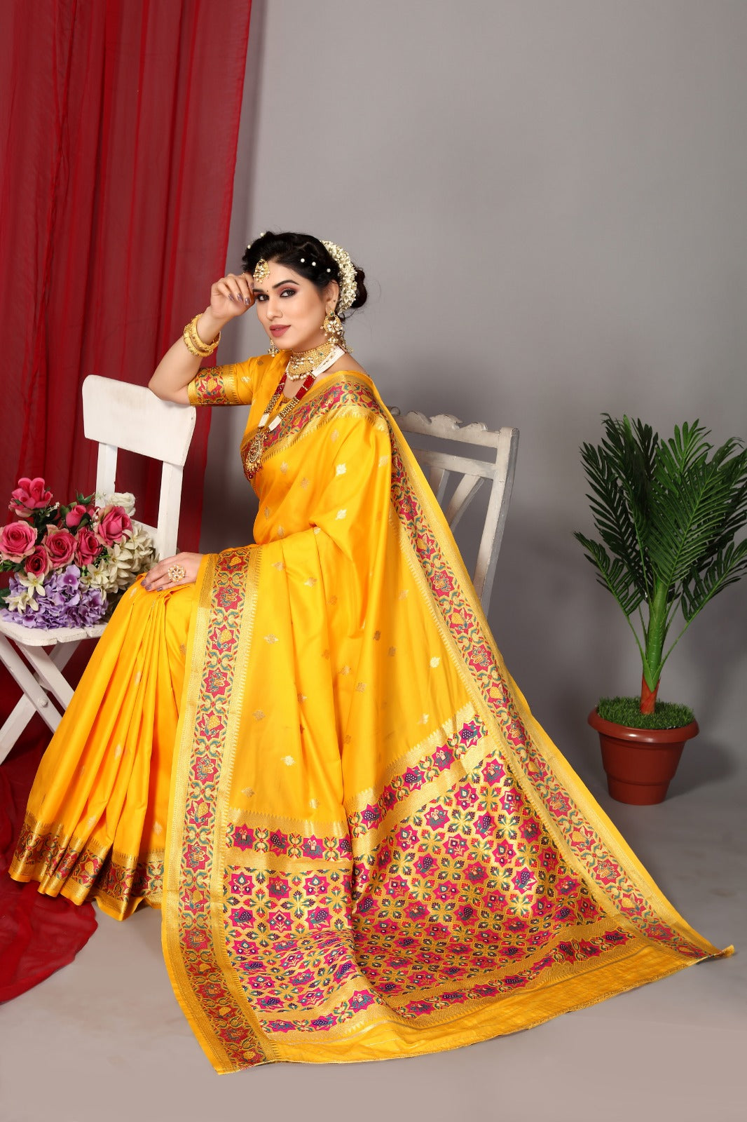 Yellow color banarasi silk saree with zari weaving work