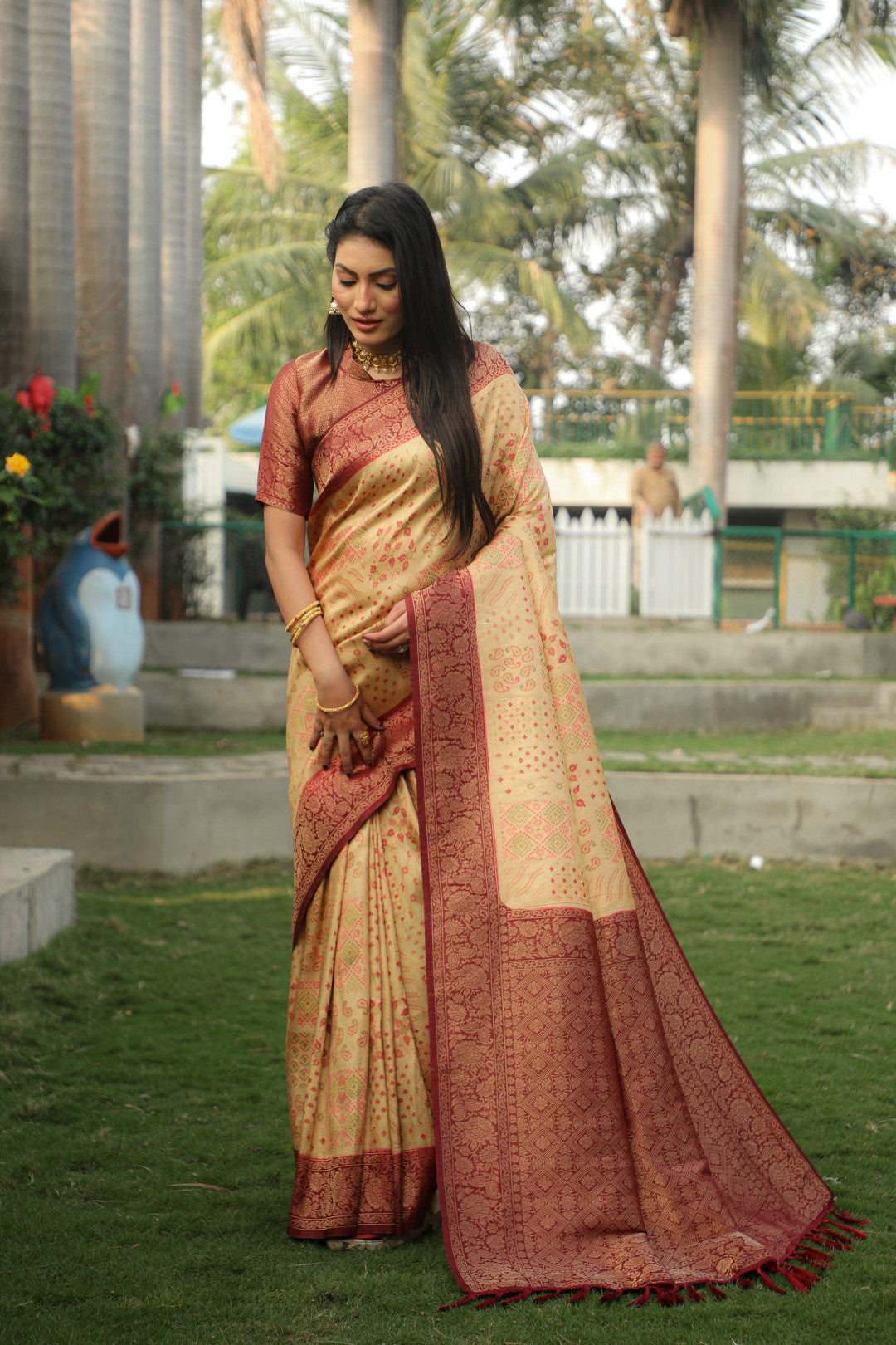 Beige color kanjivaram silk saree with zari weaving work