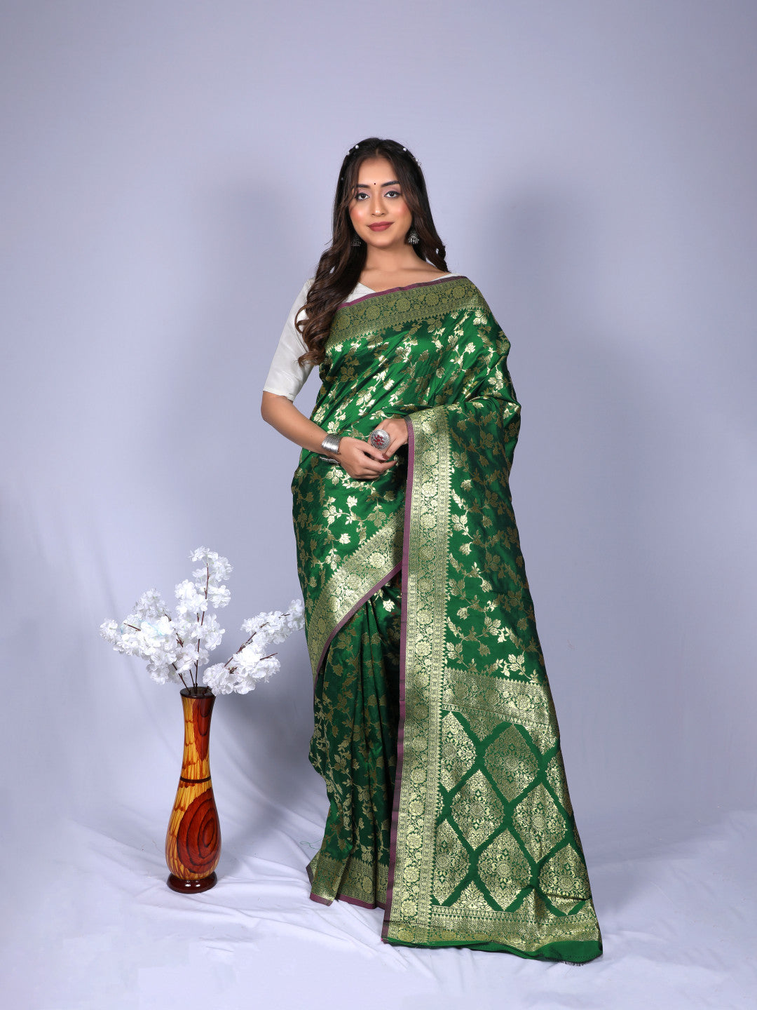 Green color pure silk saree with zari weaving work