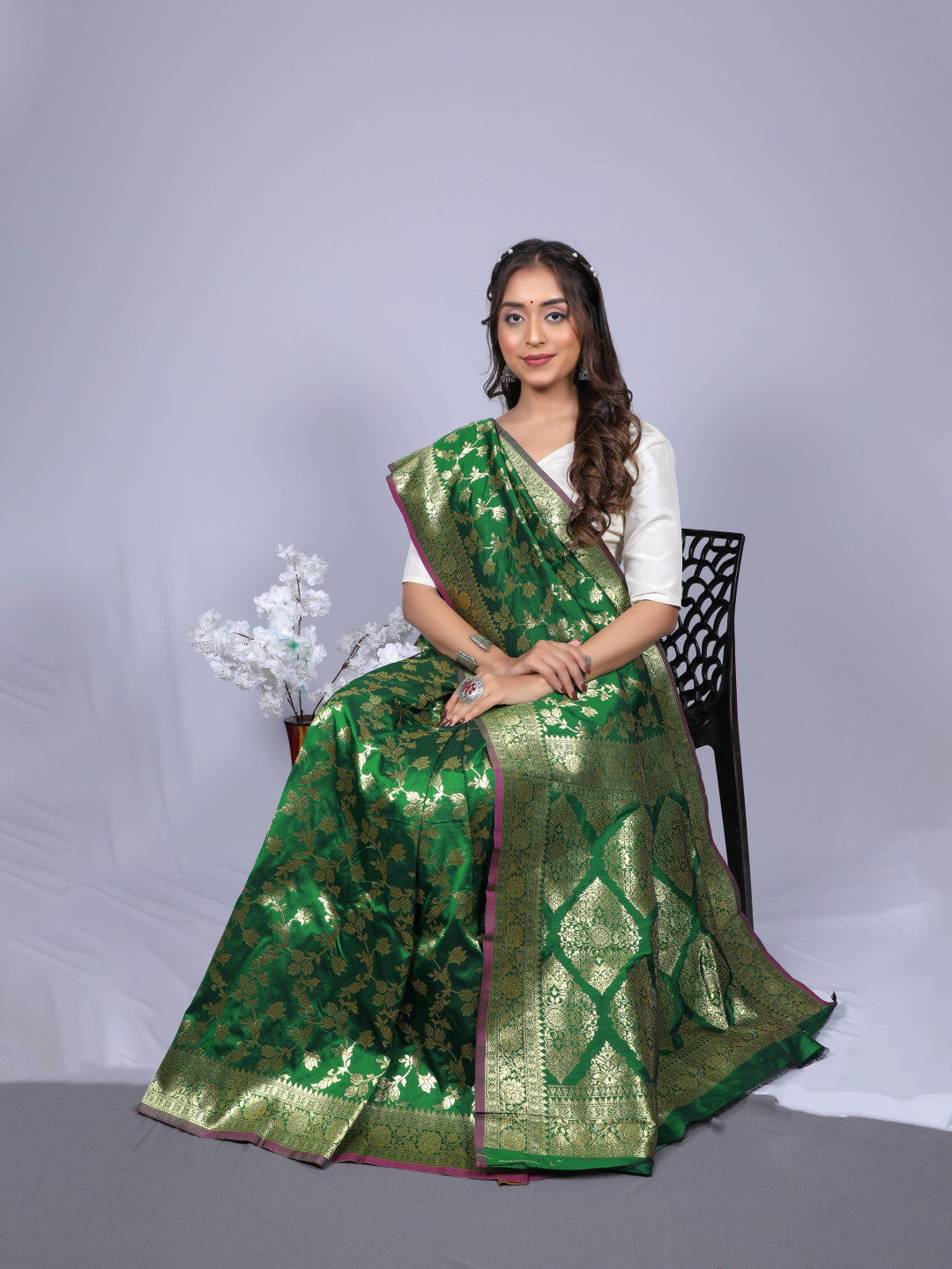Green color pure silk saree with zari weaving work