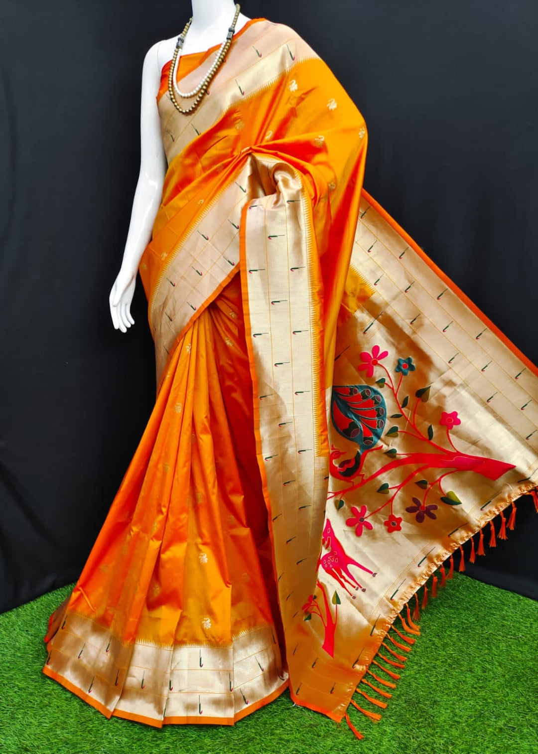 Orange color paithani silk saree with zari weaving work