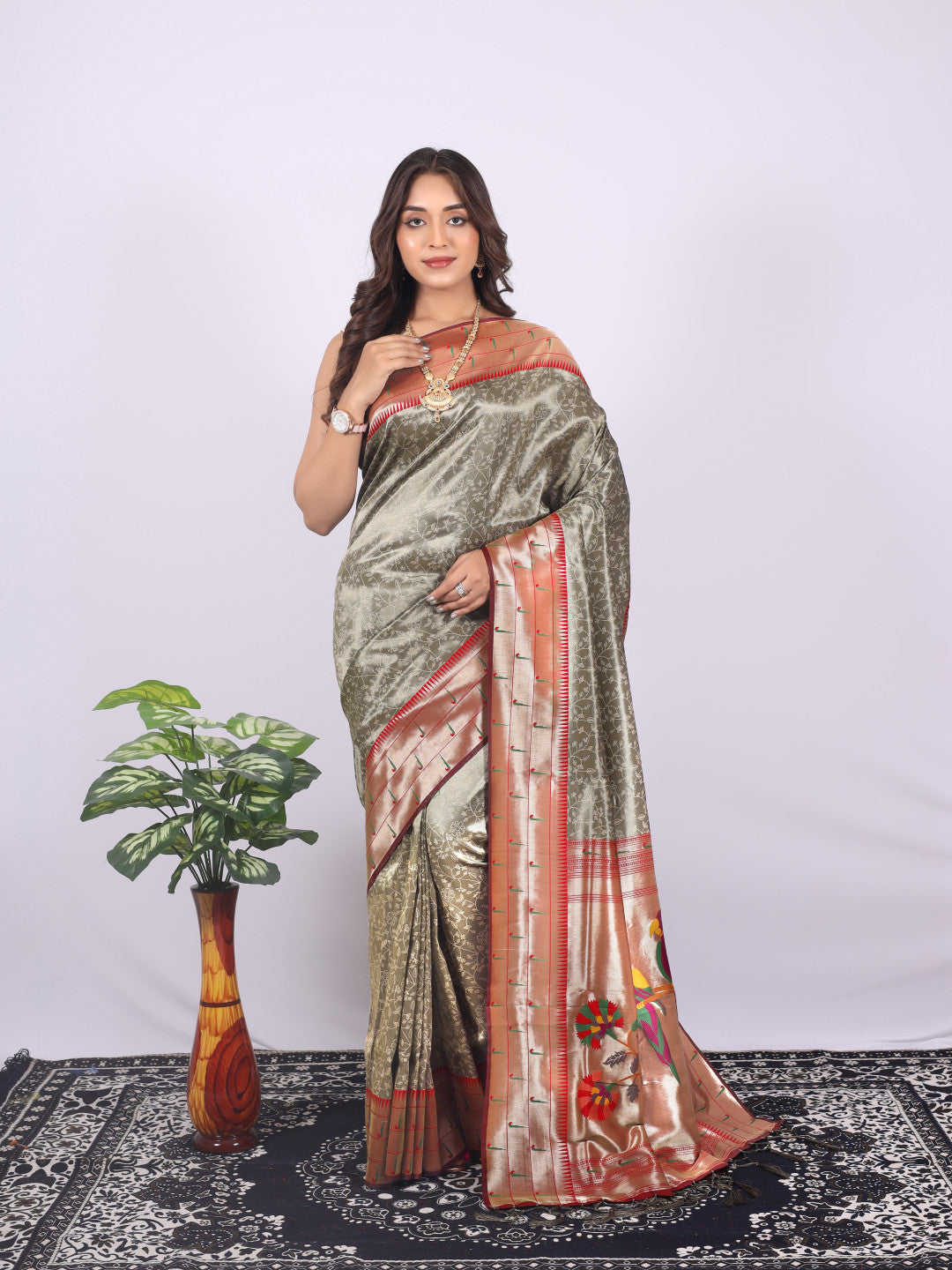 Gray color tissue silk saree with zari weaving work
