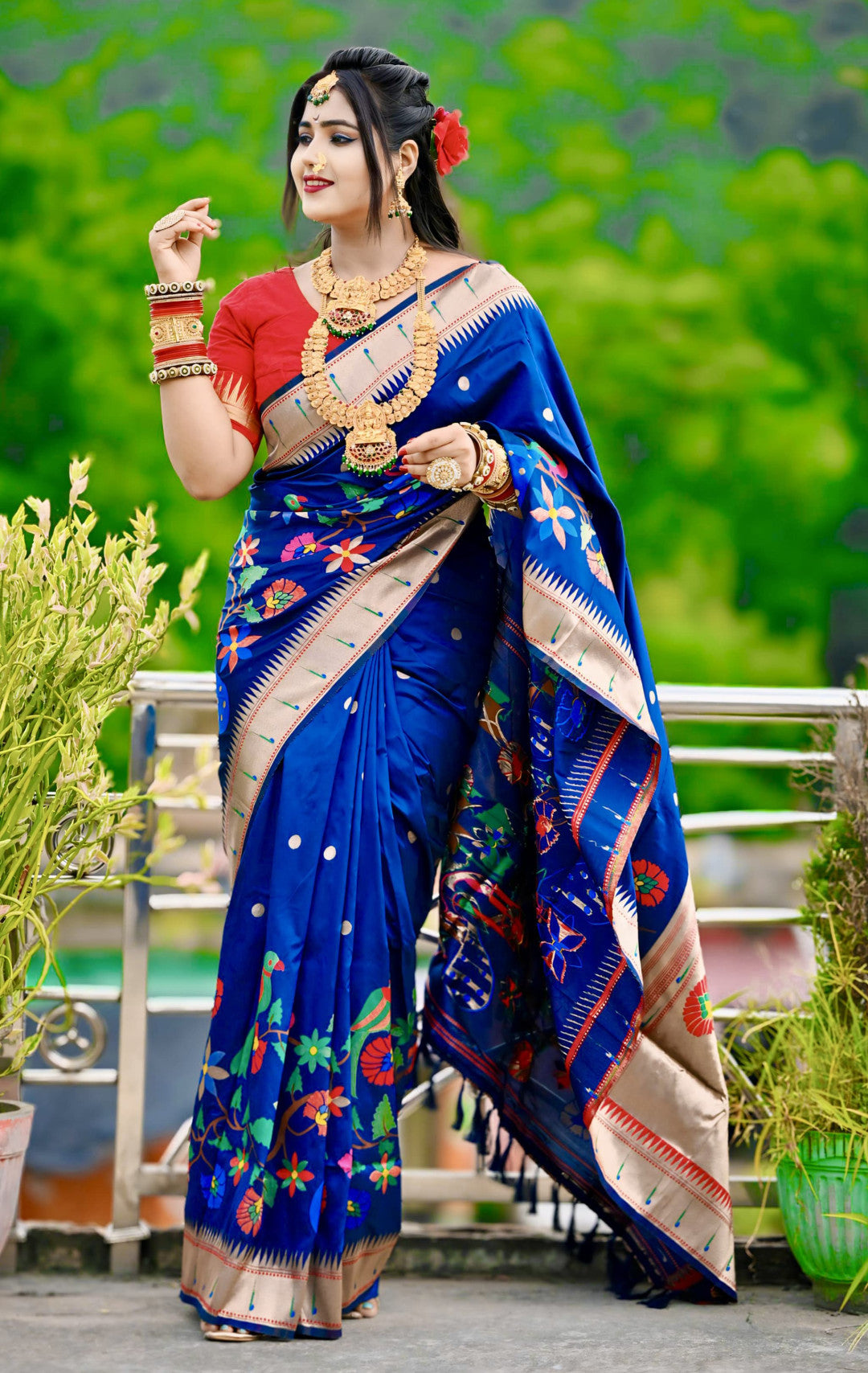 Navy blue paithani silk saree with zari weaving work
