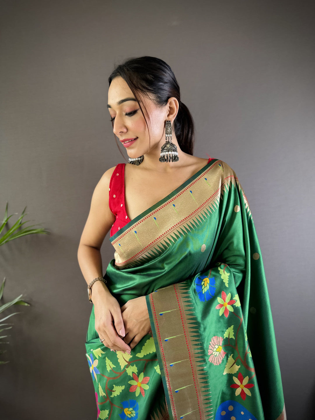 Green paithani silk saree with zari weaving work