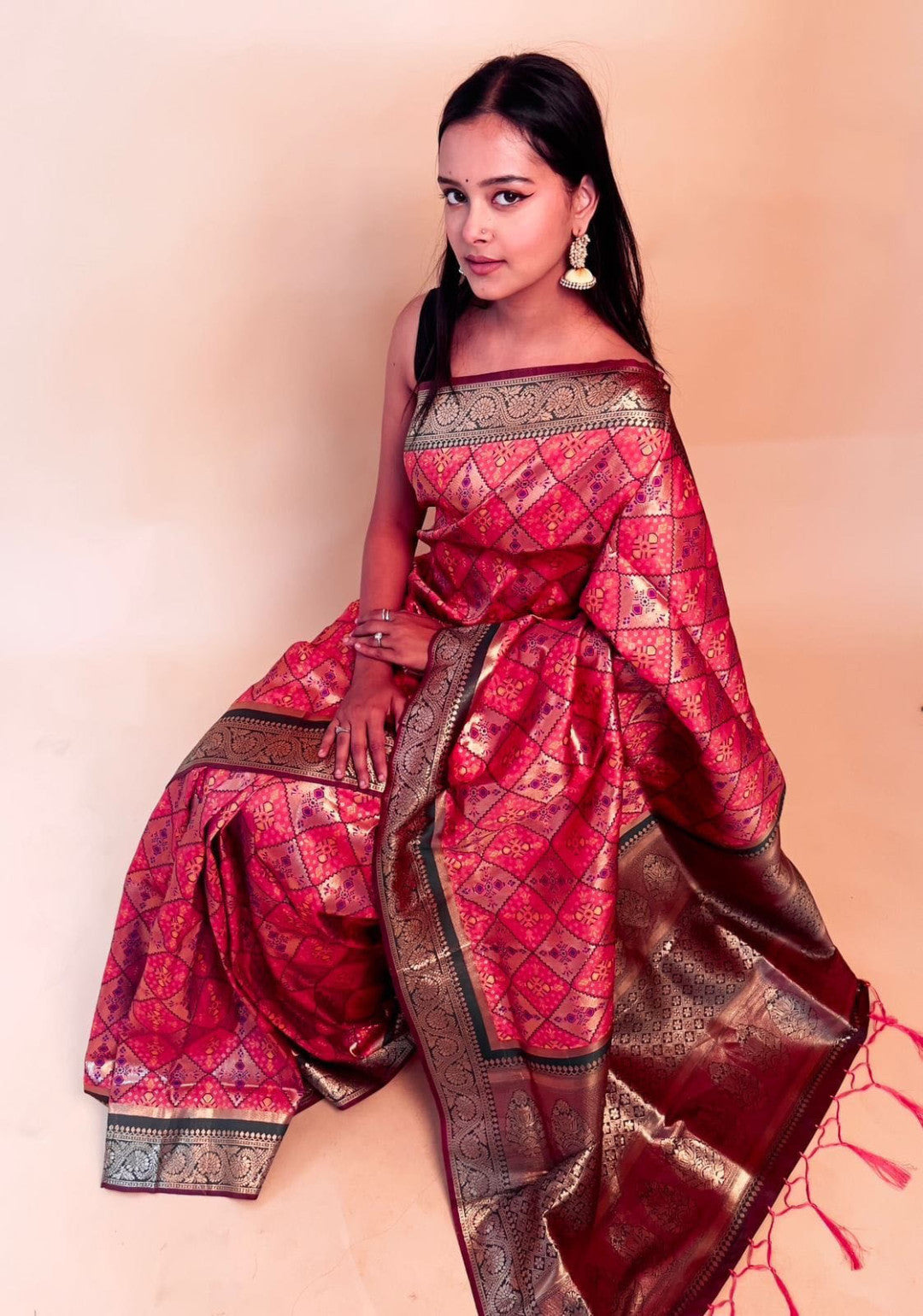 Gajari color banarasi silk saree with patola weaving work