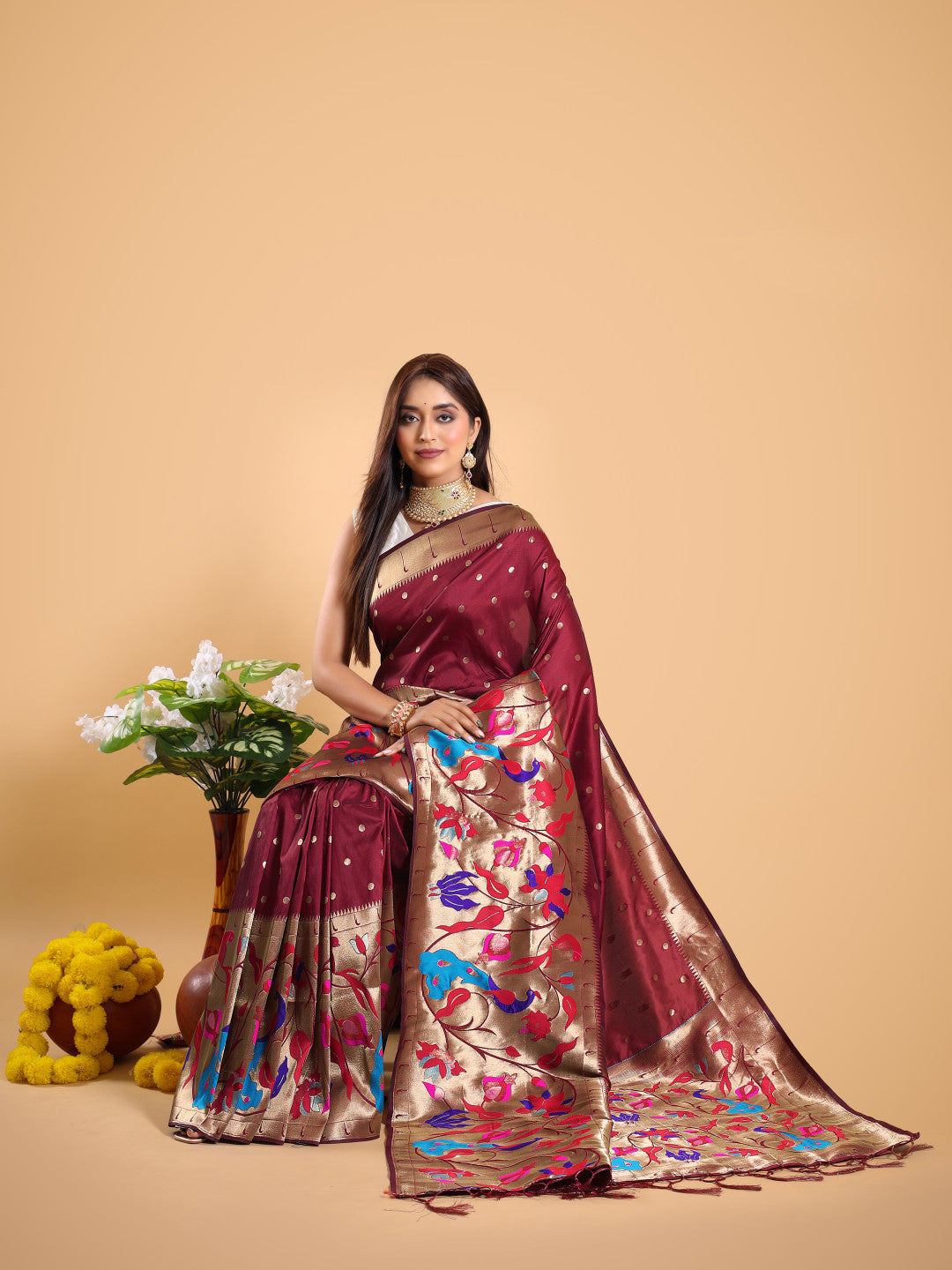 Maroon color paithani silk saree with zari weaving work