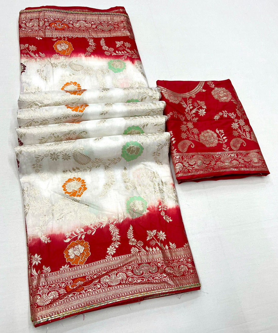 White and red color dola silk saree with zari weaving work