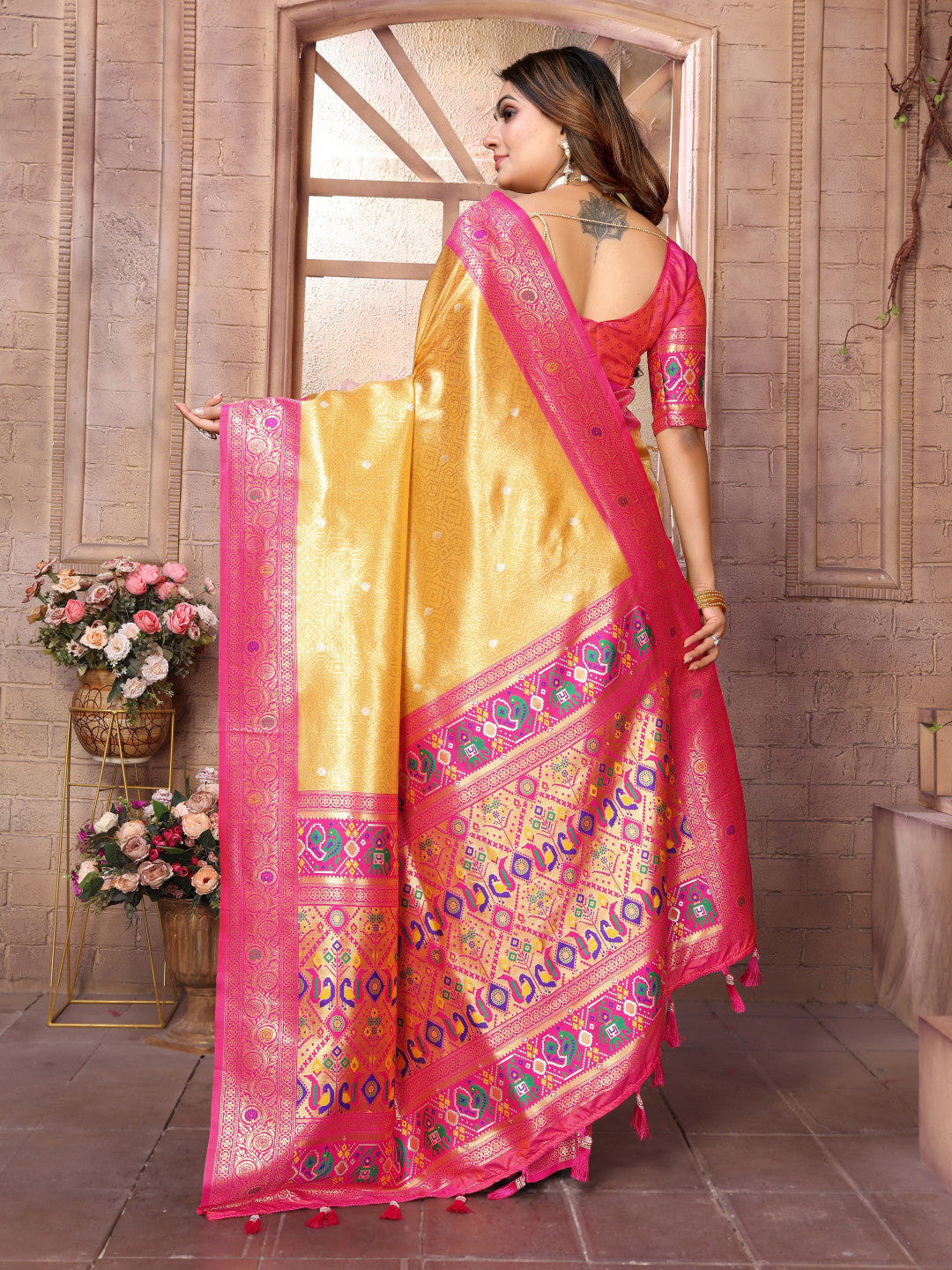 Yellow soft tissue paithani silk saree with zari weaving work