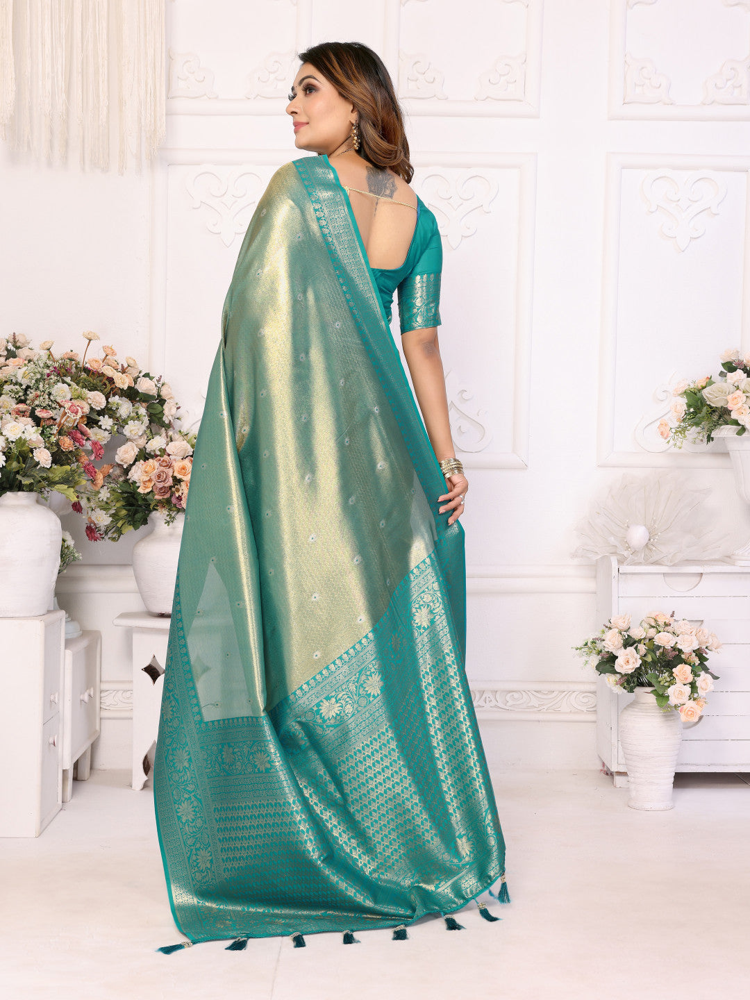 Sea green banarasi tissue silk saree with zari weaving work