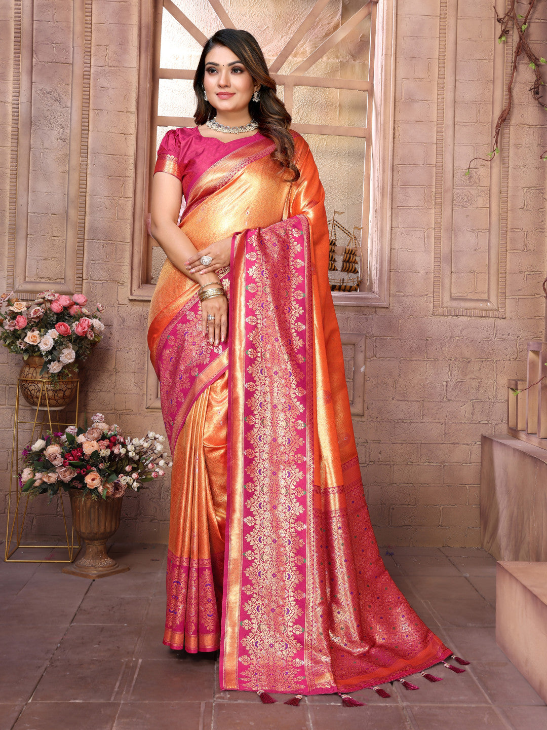 Orange kanchipuram banarasi tissue silk saree with zari weaving work