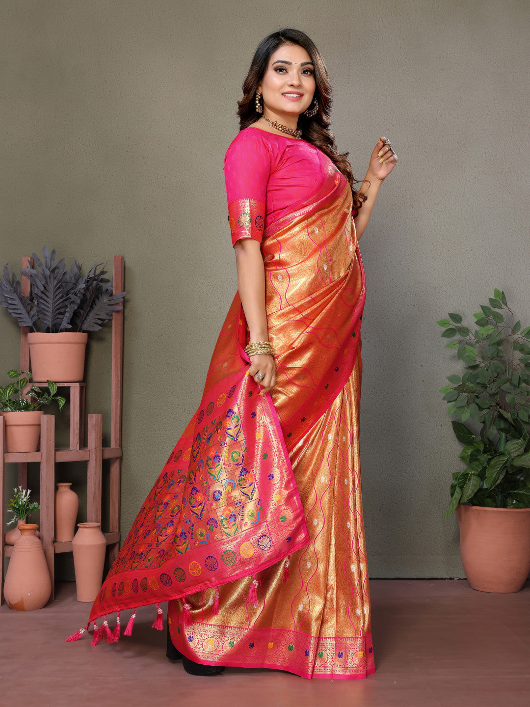 Orange banarasi tissue silk saree with zari weaving work