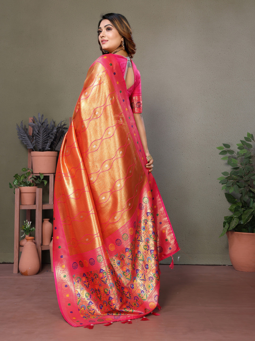 Orange banarasi tissue silk saree with zari weaving work
