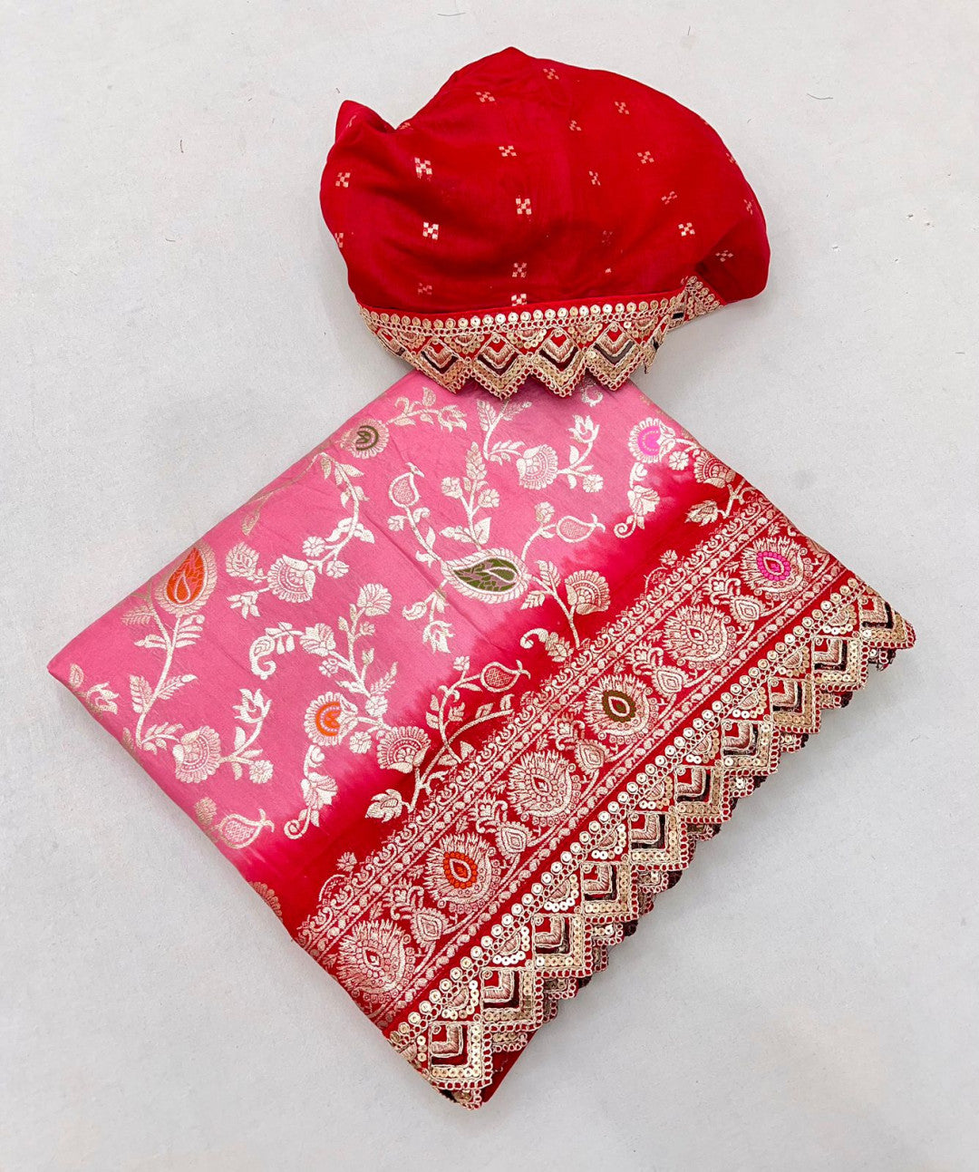 Pink muslin viscose dola silk saree with zari weaving work and lace border