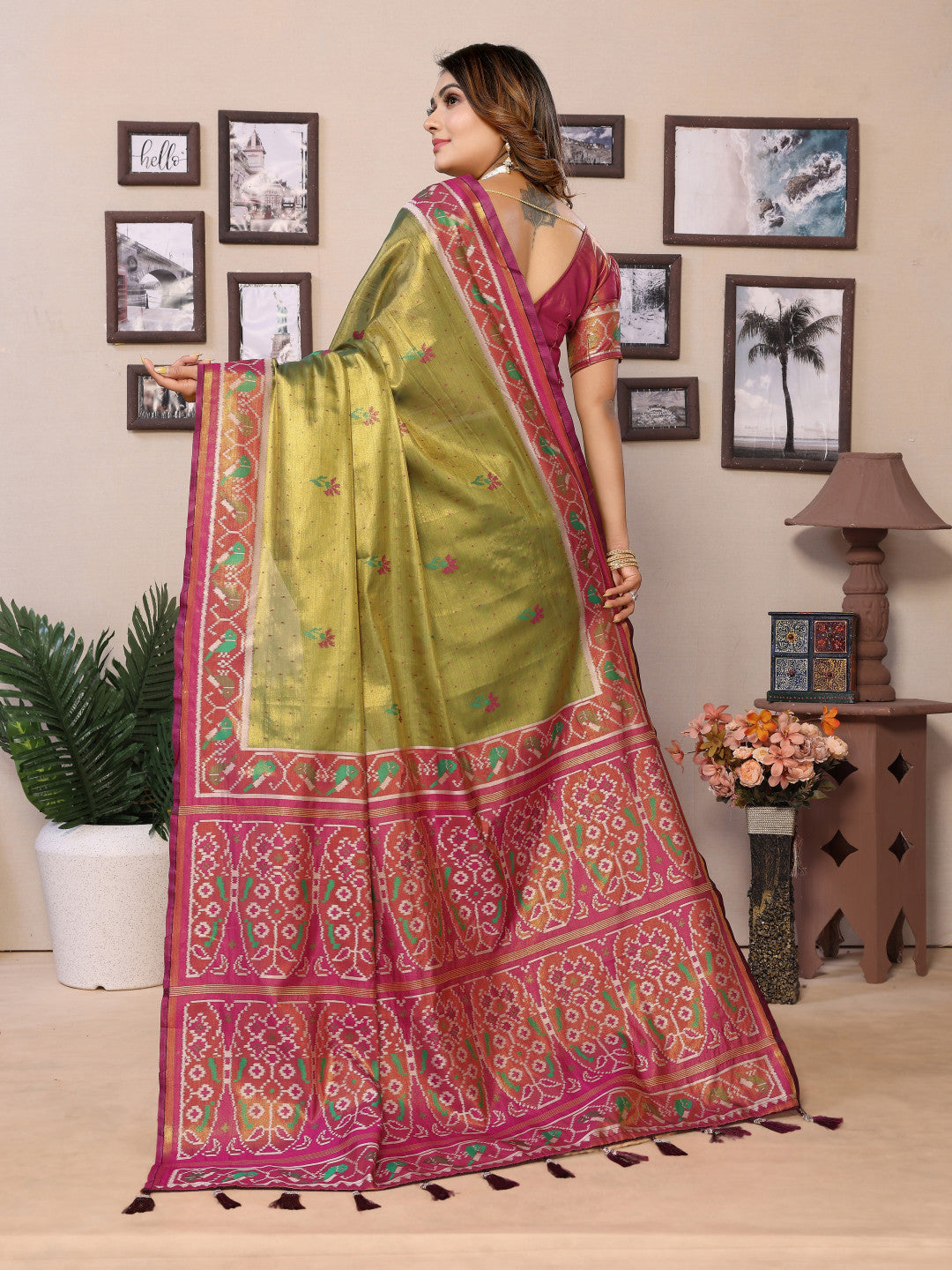 Mahendi green banarasi tissue silk saree with zari woven work