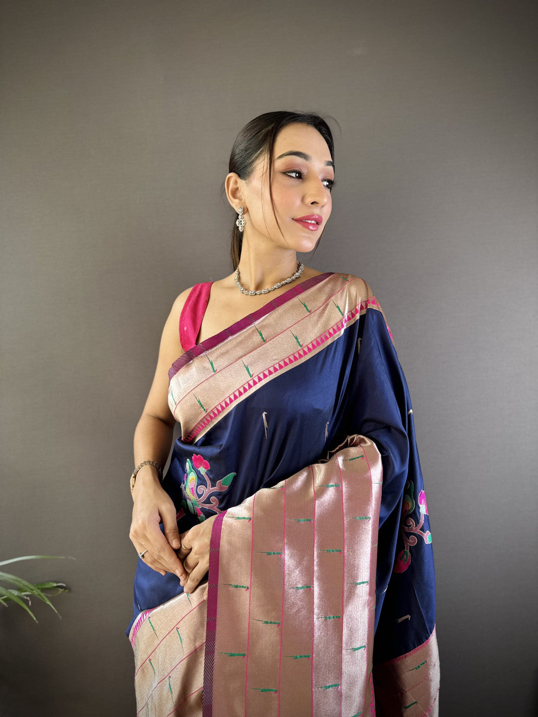 Navy blue paithani silk saree with zari weaving work