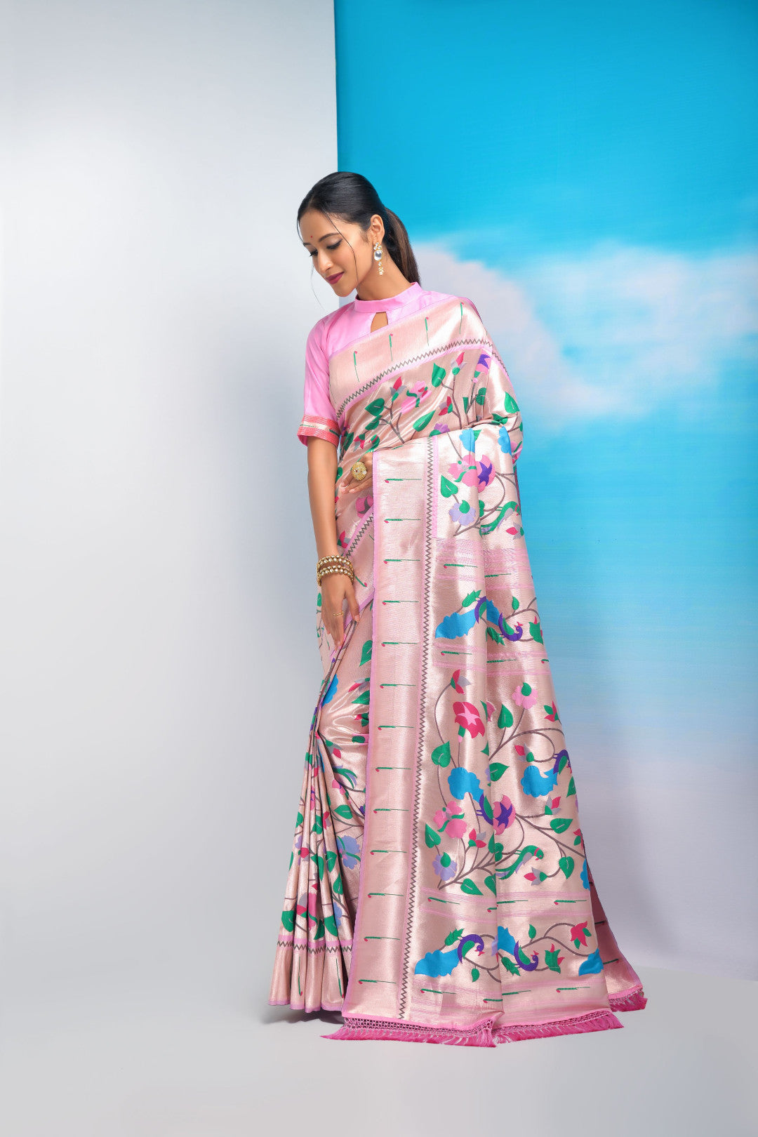 Baby pink color paithani silk saree with golden zari weaving work