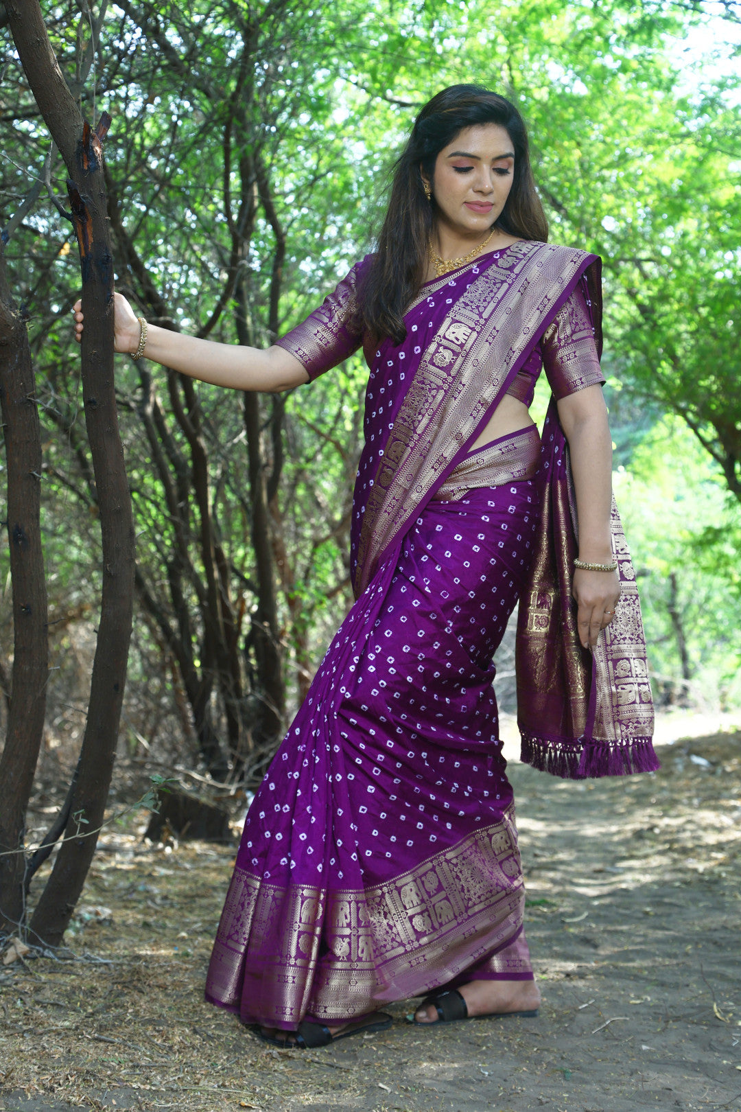 Magenta color bandhej silk saree with zari weaving work