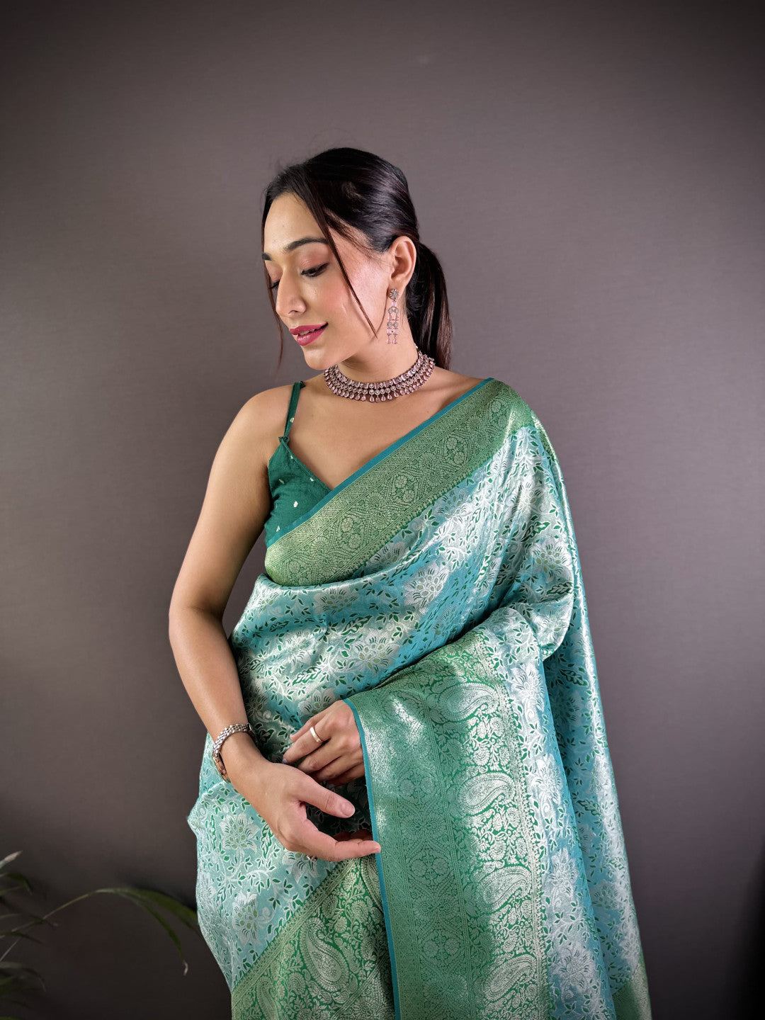 Sea green banarasi tissue silk saree with zari weaving work