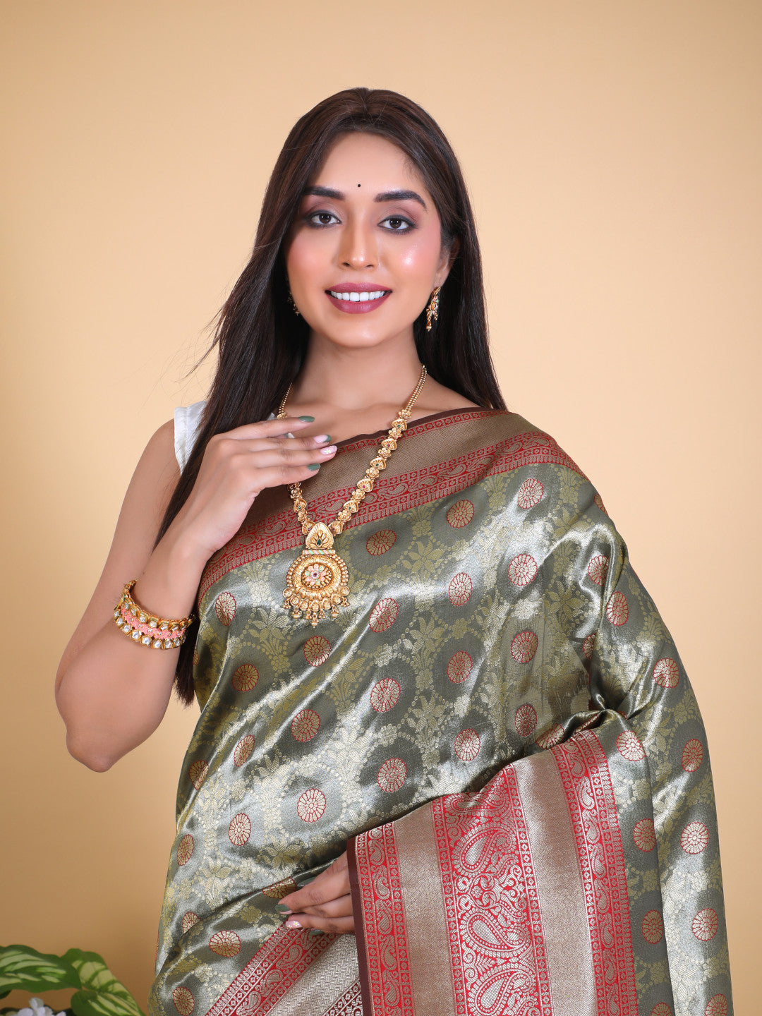 Gray color tissue silk saree with zari weaving work