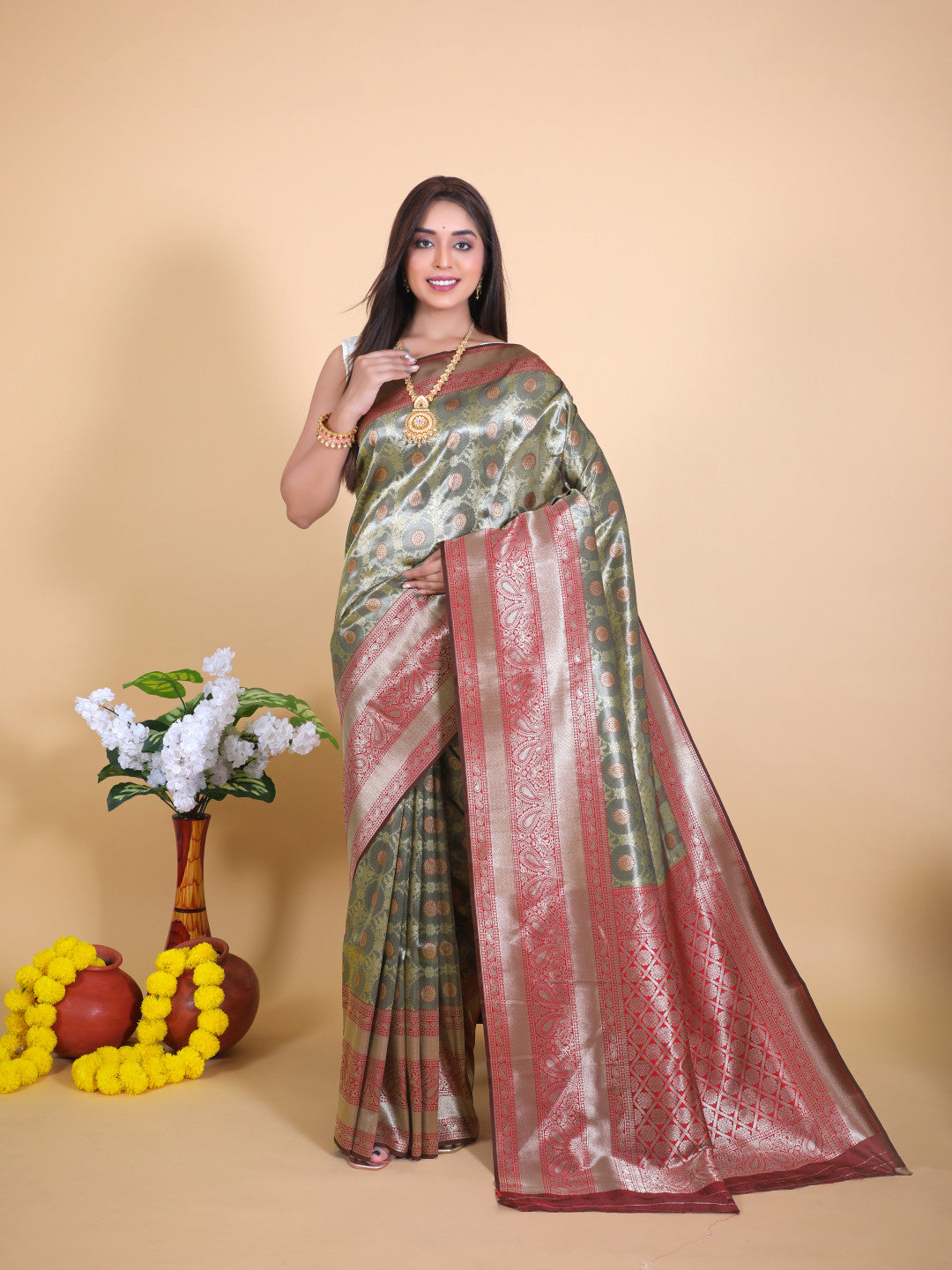 Gray color tissue silk saree with zari weaving work