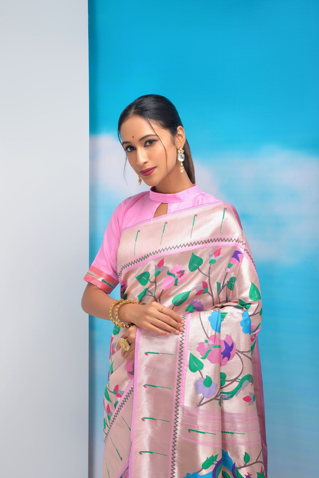 Baby pink color paithani silk saree with golden zari weaving work