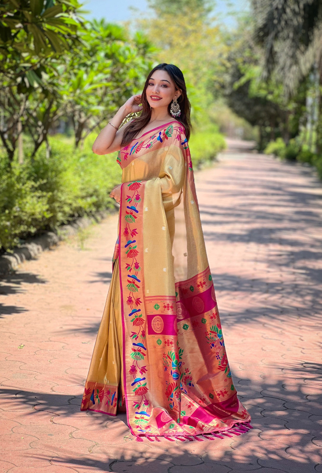 Beige color soft tissue paithani silk saree with zari weaving work