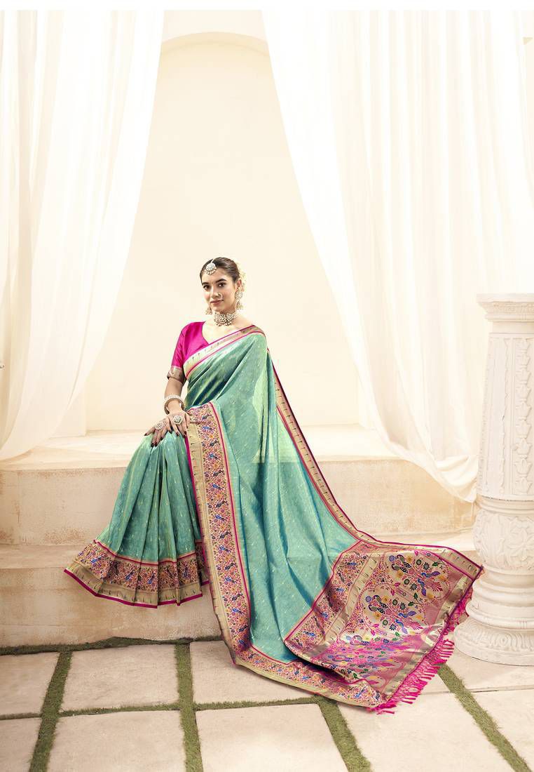 Sea green soft tissue paithani silk saree with zari weaving work